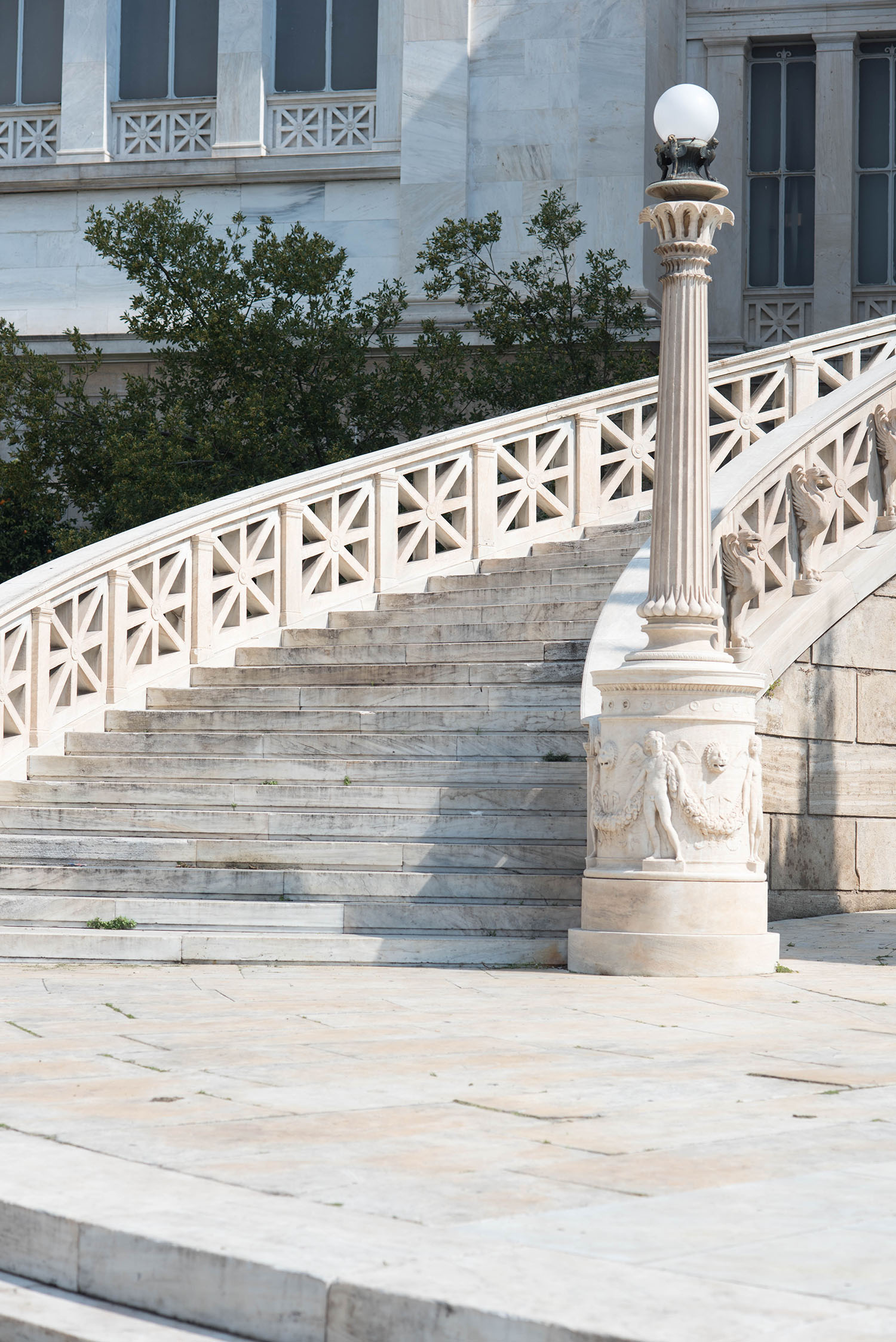 White marble staircase at the national library of greece, captured by travel blogger Cee Fardoe of Coco & Vera