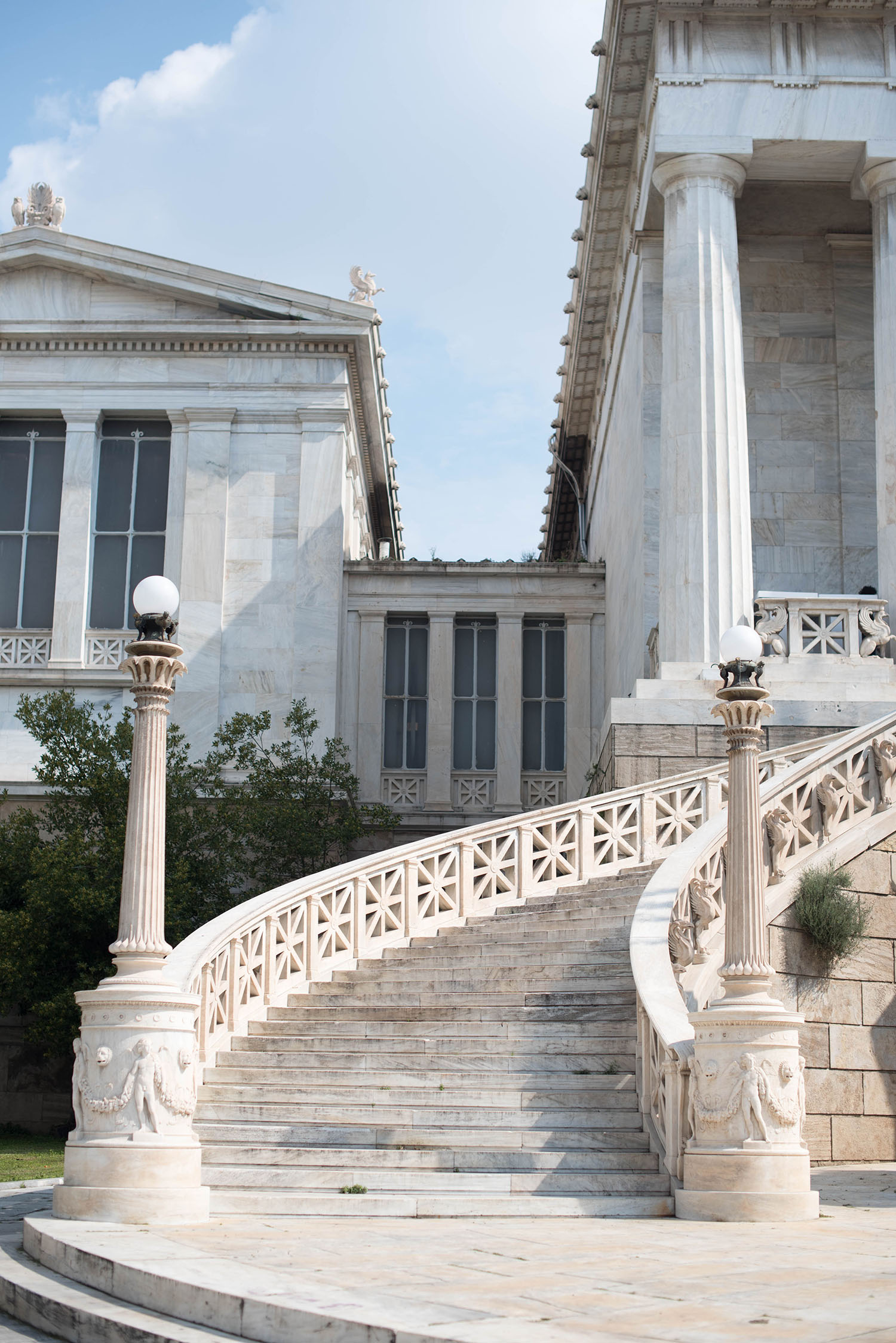 The white marble staircase of the National Library of Athens in Greece, as photographed by travel blogger Cee Fardoe of Coco & Vera