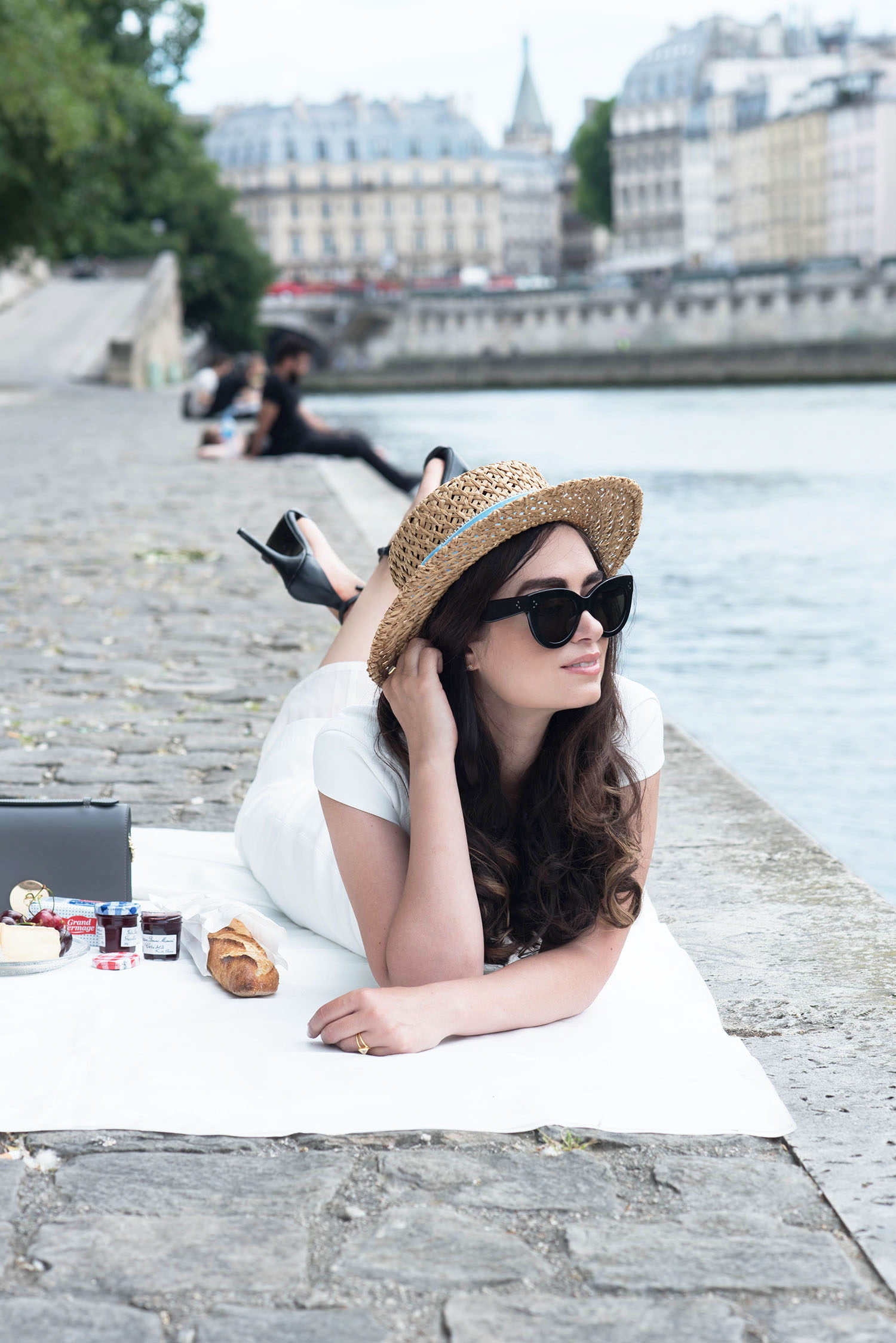 Fashion blogger Cee Fardoe of Coco & Vera celebrates Bastille Day with a picnic on the quais de la Seine wearing an Ivy & Oak dress