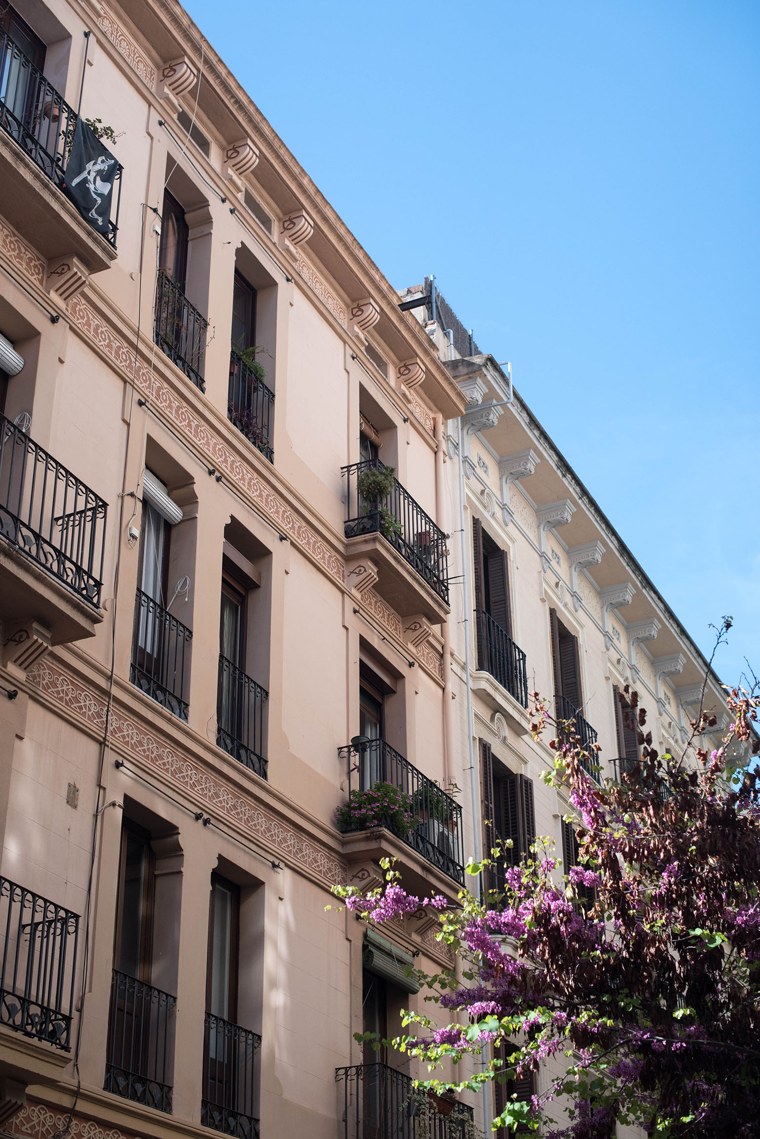 Pastel buildings in Barcelona, Spain, as photographed by Canadian travel blogger Cee Fardoe of Coco & Vera