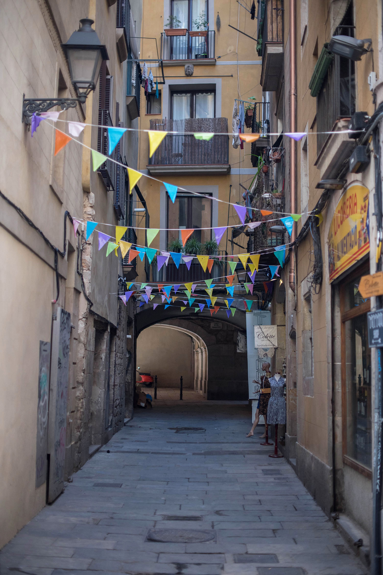 A narrow laneway in the Barri Gotic in Barcelona, as captured by Canadian travel blogger Cee Fardoe of Coco & Vera