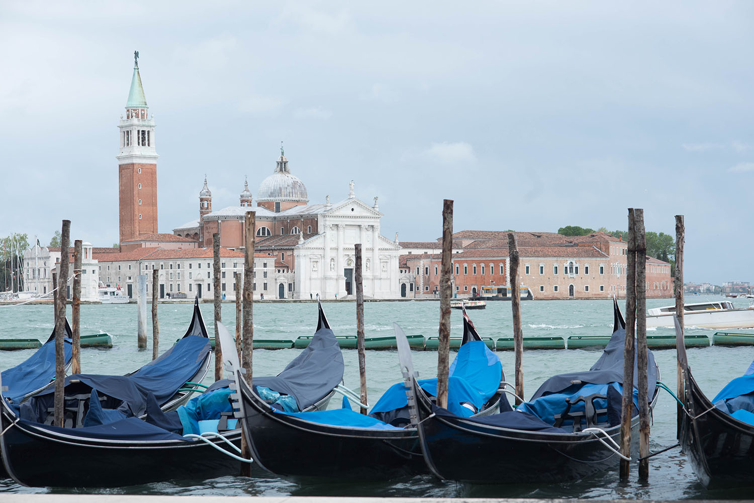 Gondolas float on the Grand Canal in Venice, as photographed by Winnipeg travel blogger Cee Fardoe of Coco & Vera