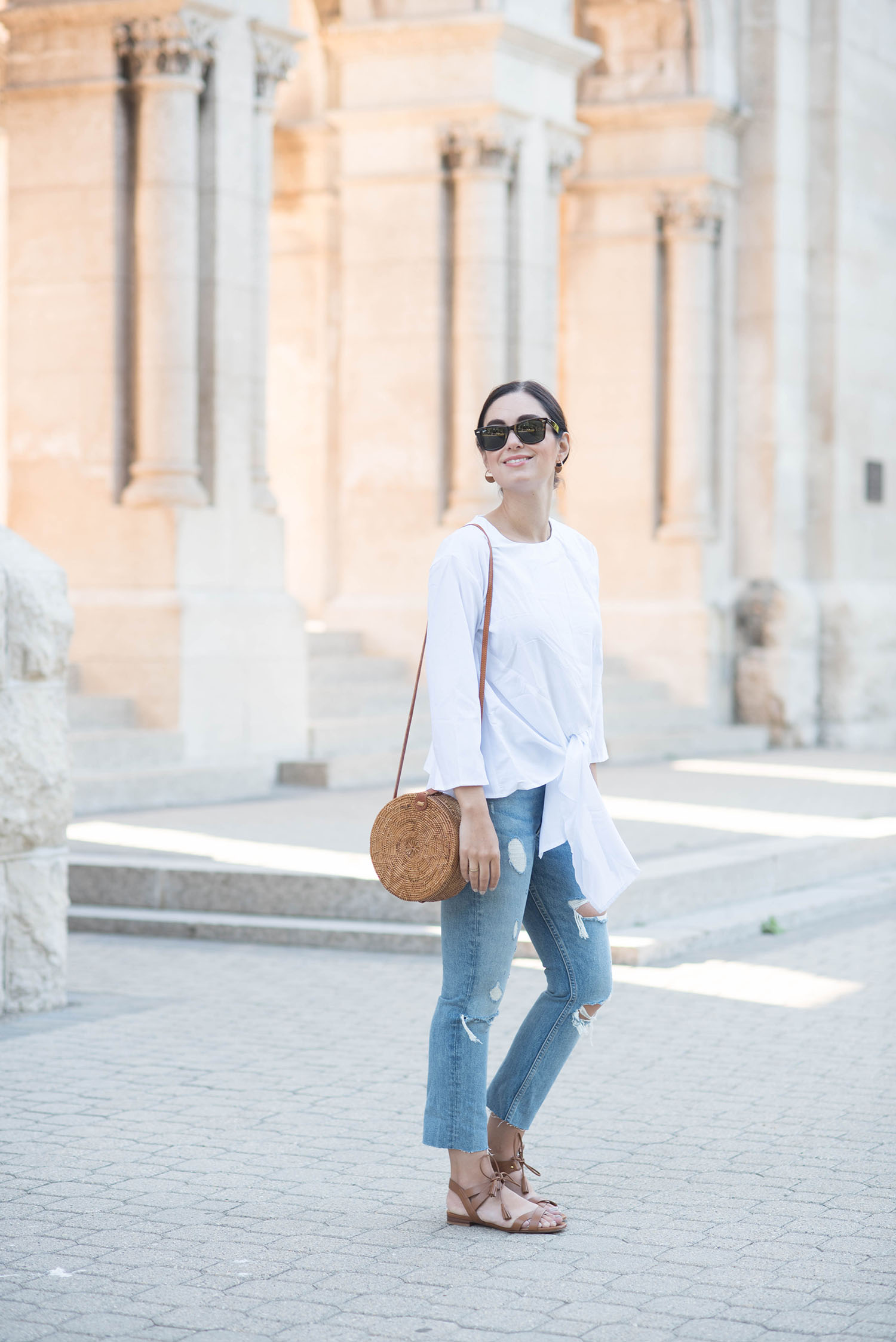 Fashion blogger Cee Fardoe of Coco & Vera stands outside Saint Boniface cathedral wearing an Missy Empire Araceli blouse and Grlfrnd Karolina jeans