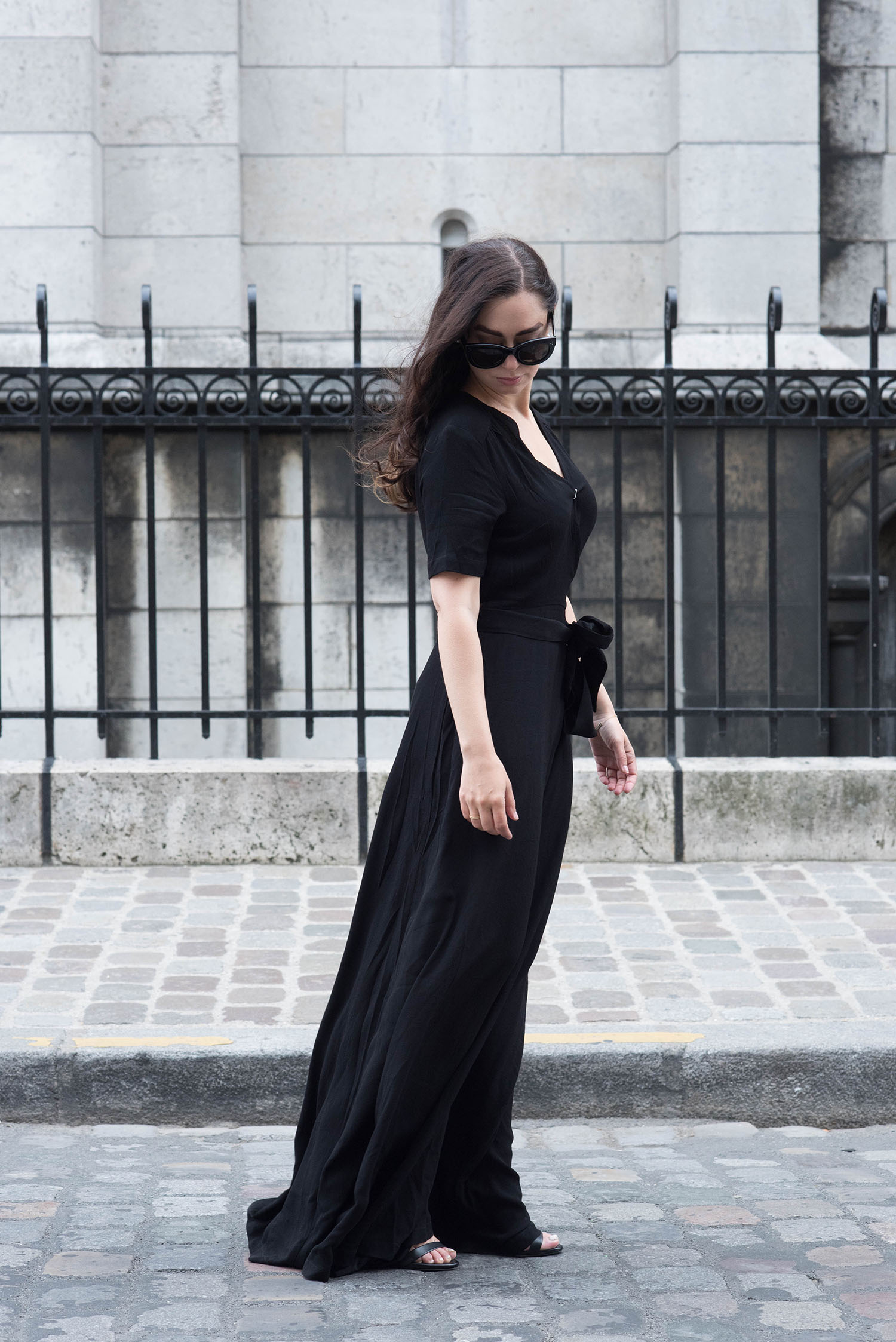 Fashion blogger Cee Fardoe of Coco & Vera wears a black Ivy & Oak maxi dress and Celine Audrey sunglasses in Paris