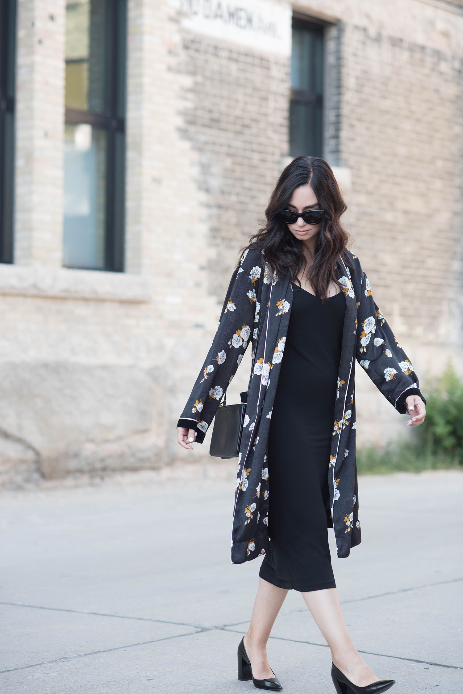 Fashion blogger Cee Fardoe of Coco & Vera walks in the Exchange District of Winnipeg wearing a Zara combined kimono and Pierre Hardy block heels, carrying a Celine trio bag