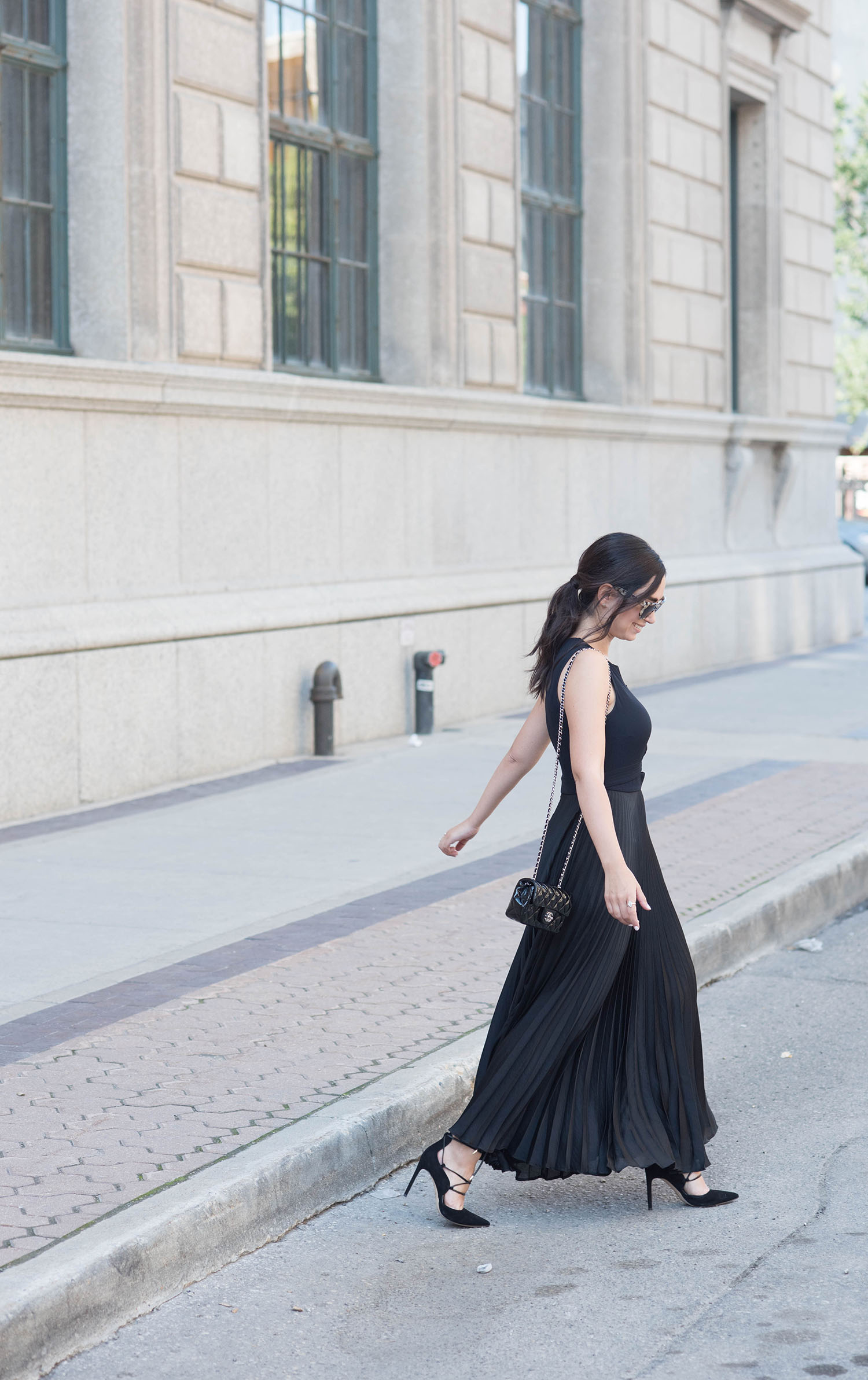 Fashion blogger Cee Fardoe of Coco & Vera wears an ALC pleated maxi dress and a ponytail styled by Fran Rizzutto