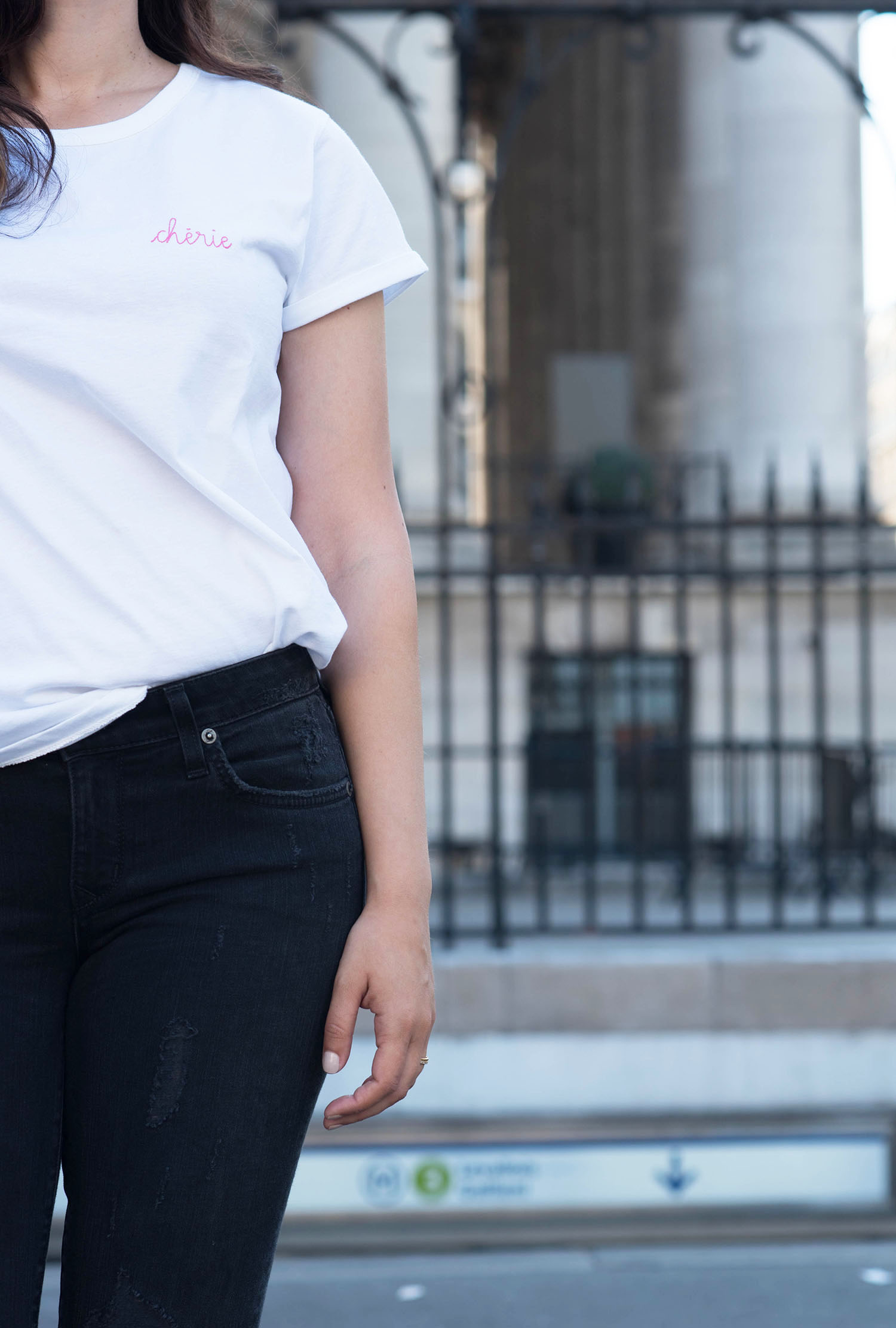 Outfit details on fashion blogger Cee Fardoe of Coco & Vera, wearing a Maison Labiche Cherie tee and Lovers + Friends jeans