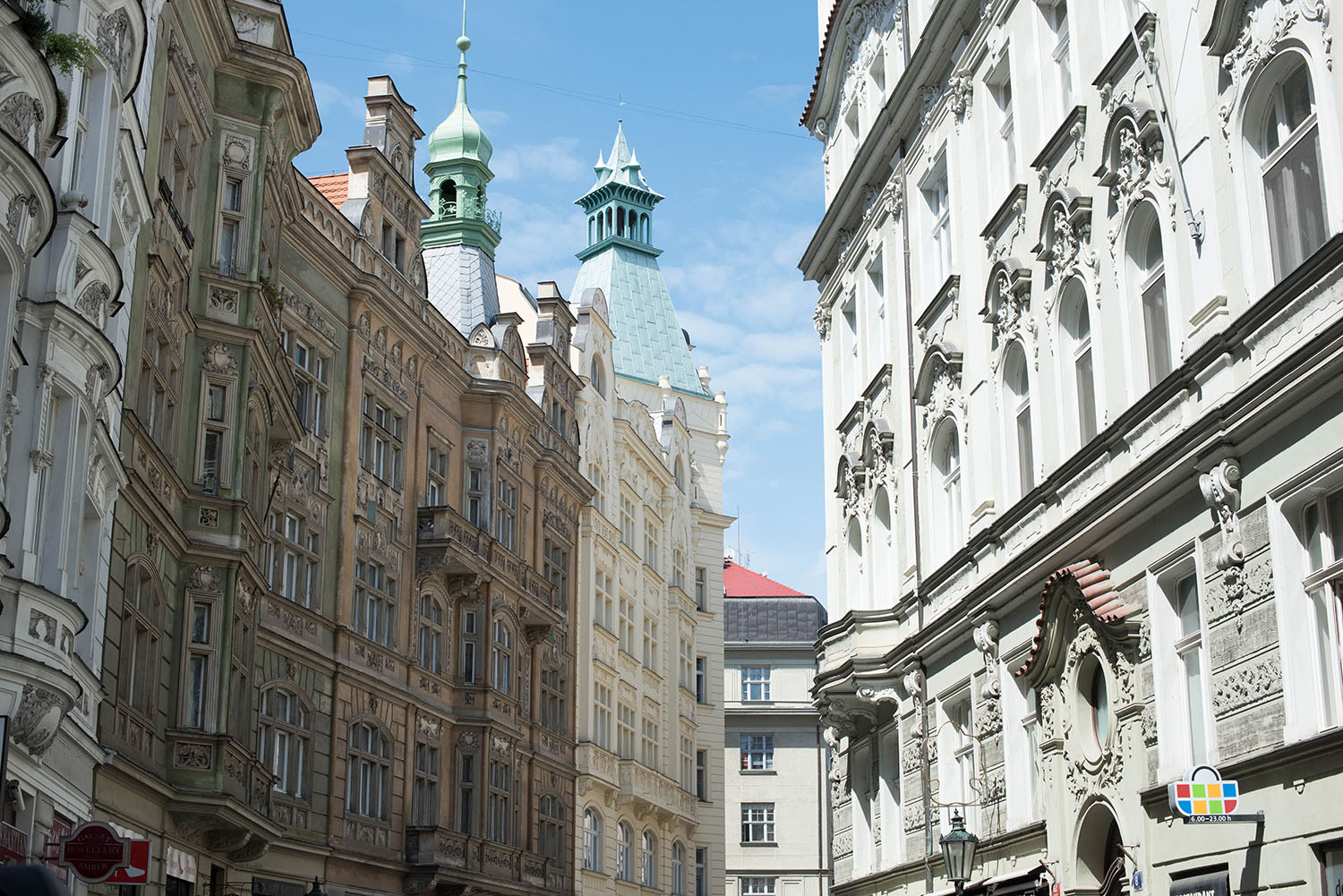 Pastel buildings near Old Town Square in Prague, as photographed by travel blogger Cee Fardoe of Coco & Vera