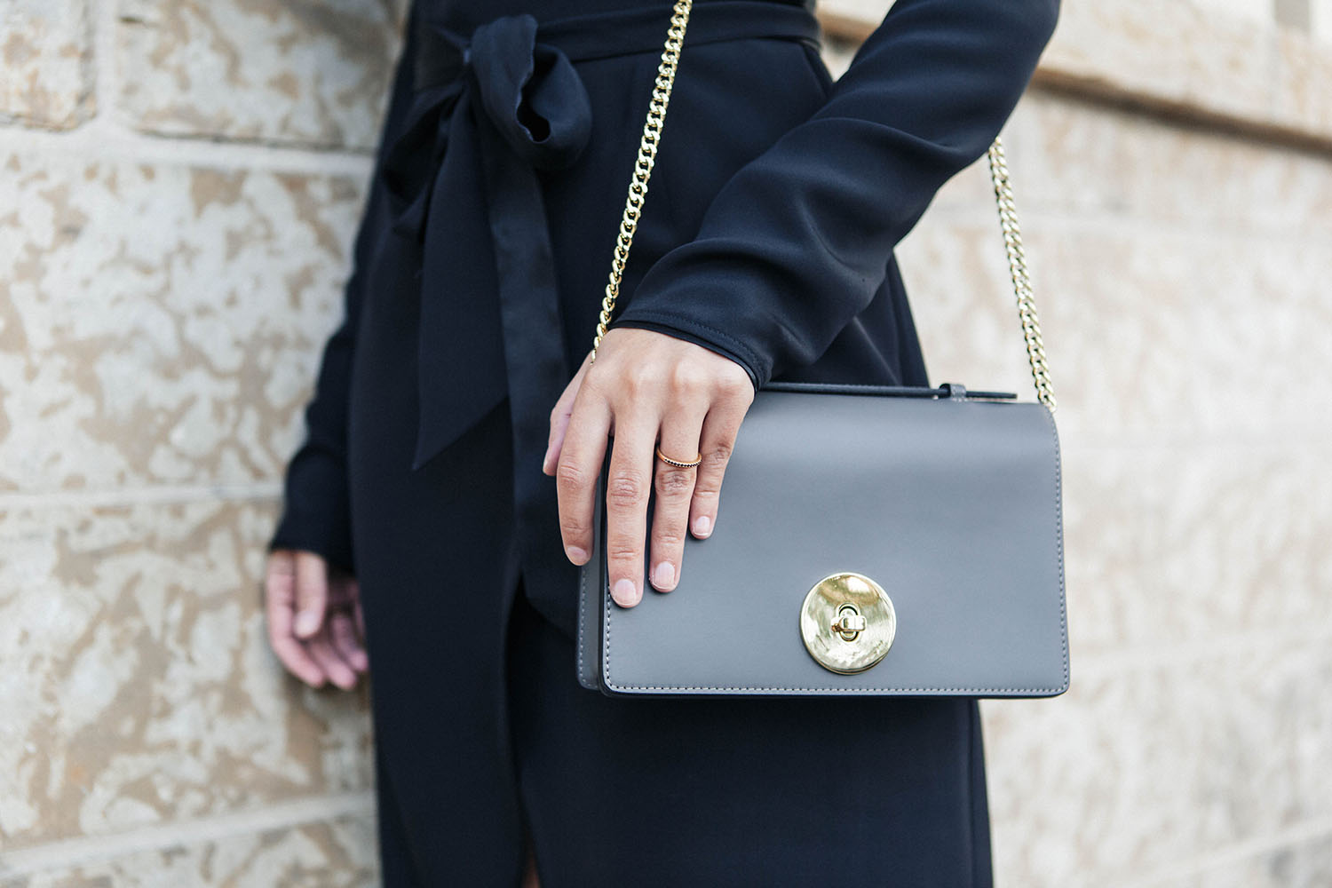 Outfit details on Winnipeg fashion blogger Cee Fardoe of Coco & Vera, including a grey Camelia Roma bag, as photographed by Christa Wong Photography 