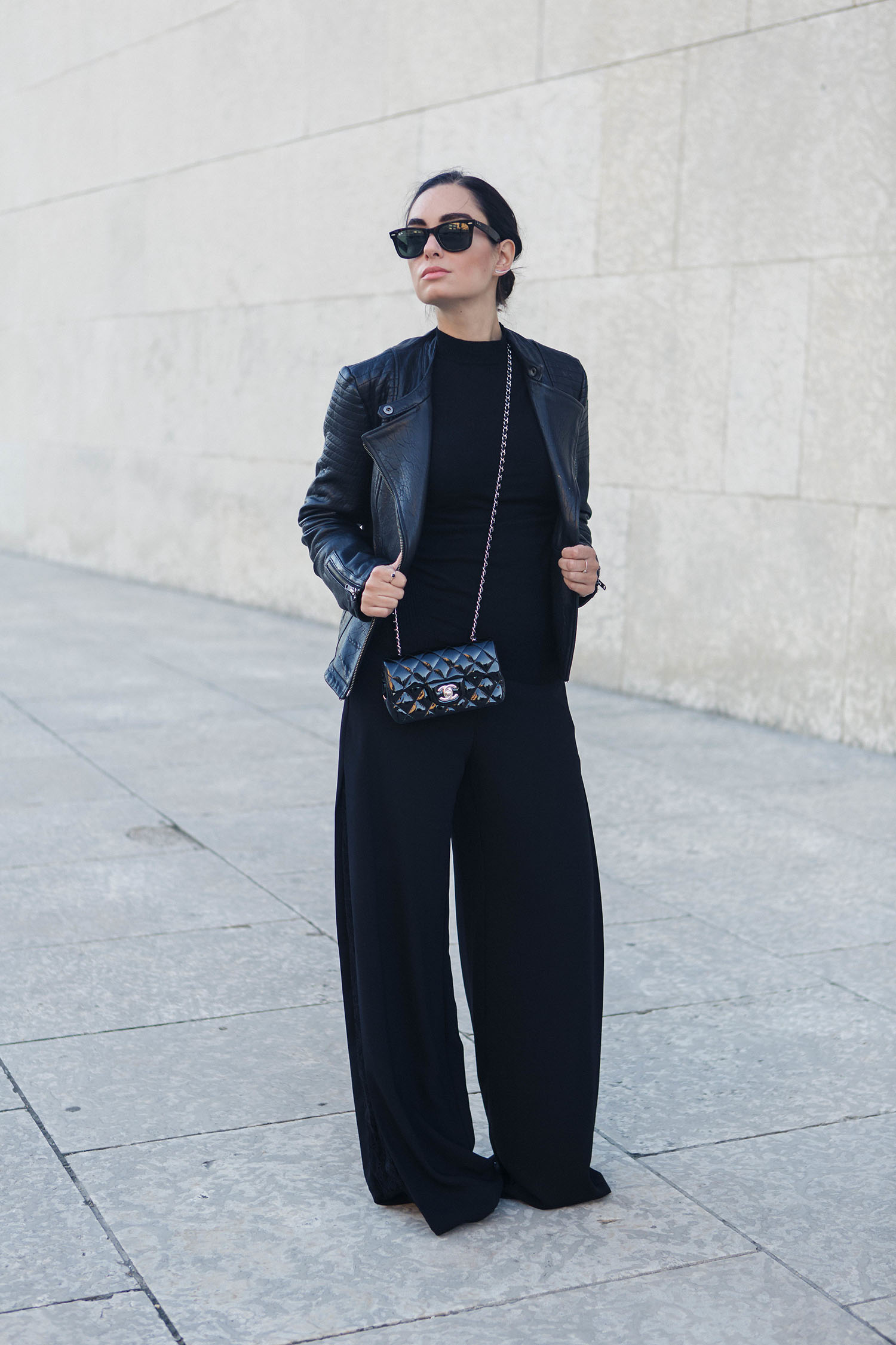 Fashion blogger Cee Fardoe of Coco & Vera photographed by Christa Wong Photography in all black everything, including Zara palazzo pants and a Chanel 2.55 handbag
