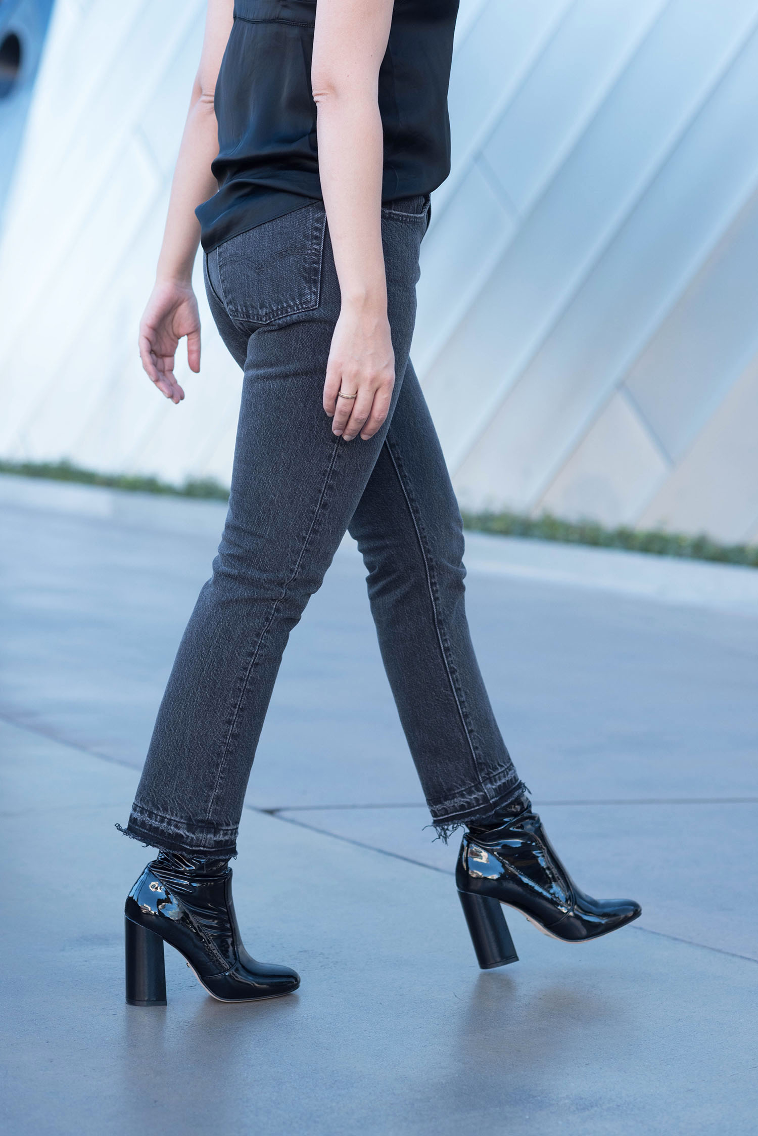 Outfit details on Winnipeg fashion blogger Cee Fardoe of Coco & Vera, including black Levis 501 skinny jeans and Raye patent ankle boots