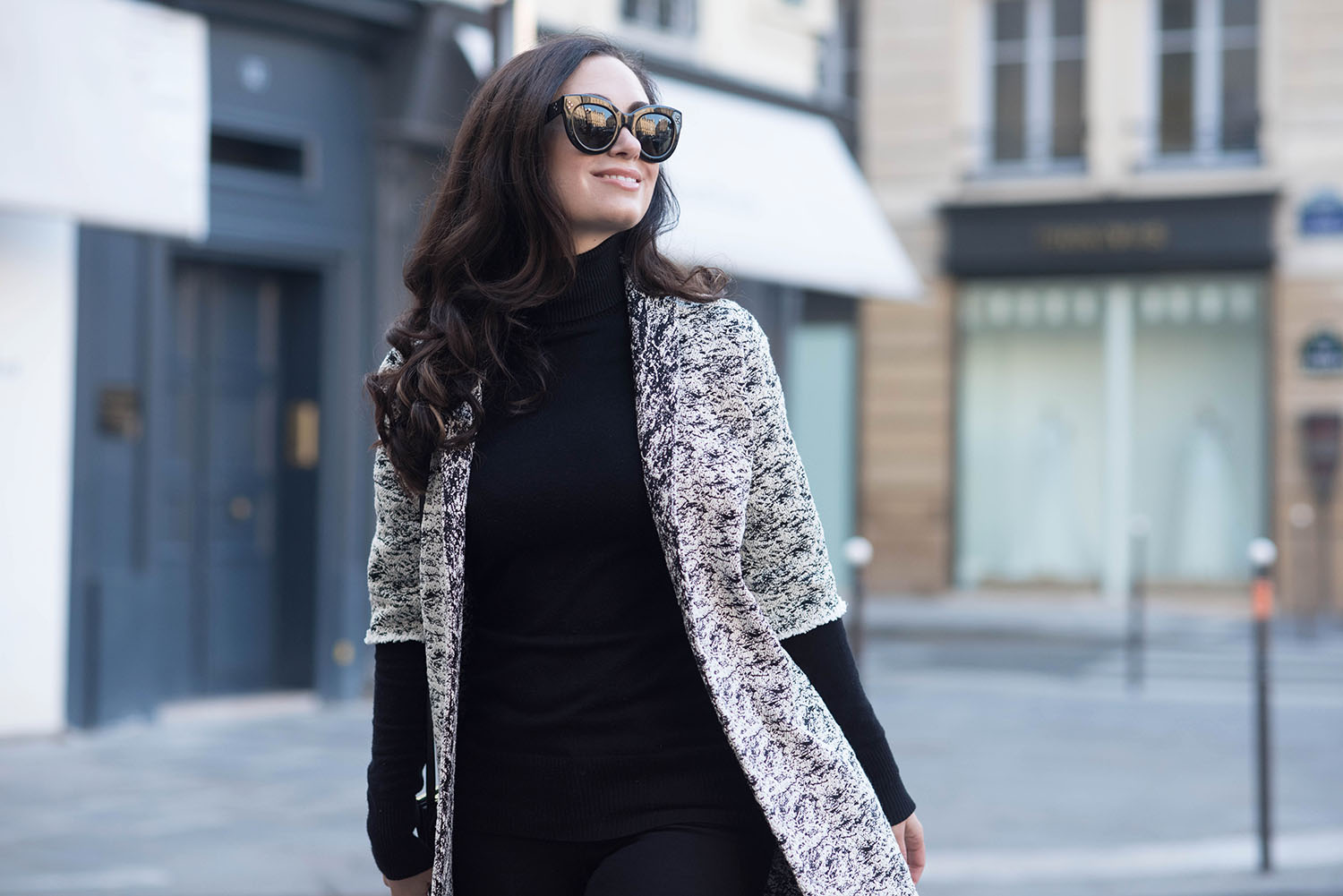 Portrait of Winnipeg fashion blogger Cee Fardoe of Coco & Vera in Paris wearing a Floriane Fosso coat and Celine Audrey sunglasses