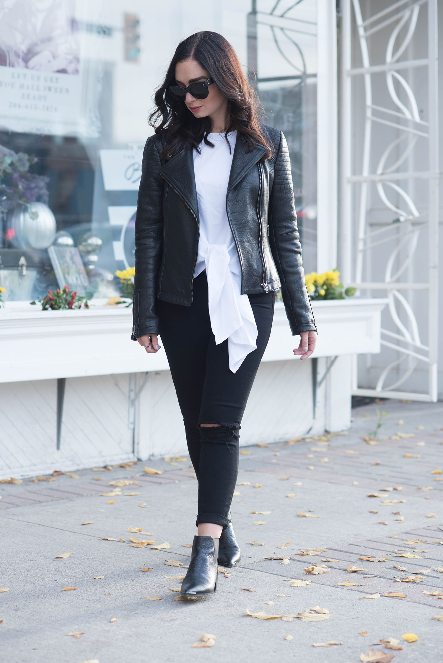 Fashion blogger Cee Fardoe of Coco & Vera wears a Missy Empire Araceli blouse with black Paige Denim jeans
