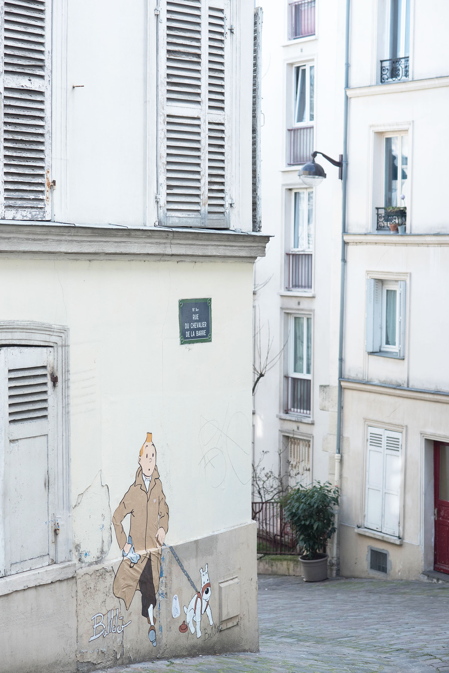 Tintin graffiti on the streets of Montmartre in Paris, as captured by travel blogger Cee Fardoe of Coco & Vera