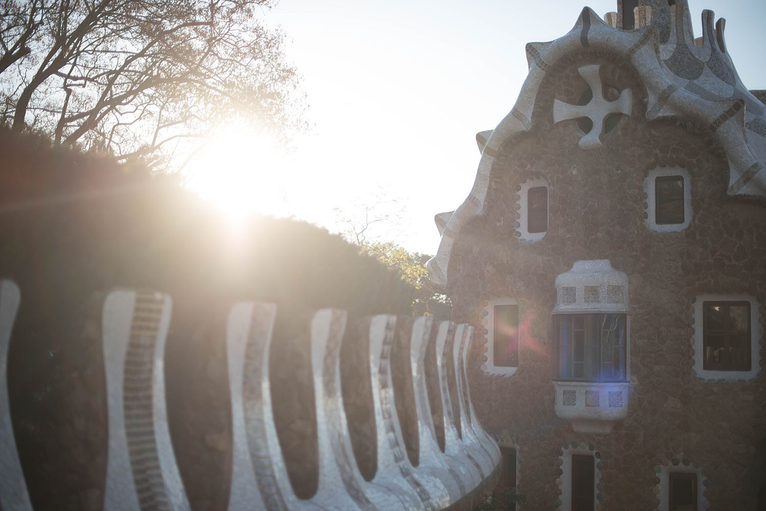 Sunrise flares at Parc Guell in Barcelona, Spain, as captured by Canadian travel blogger Cee Fardoe of Coco & Vera