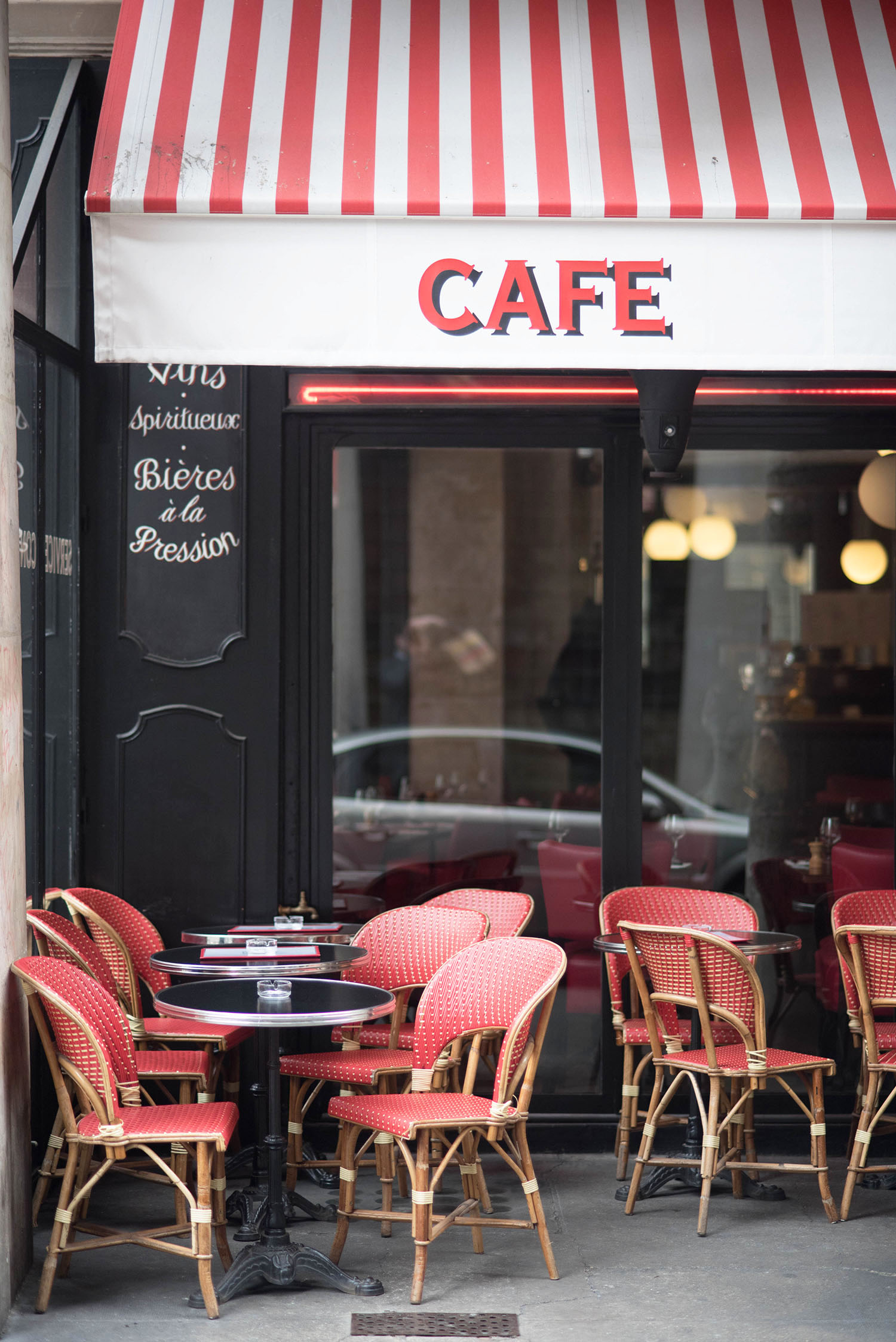 A black and red cafe in Paris, as captured by top Winnipeg travel blogger Cee Fardoe of Coco & Vera