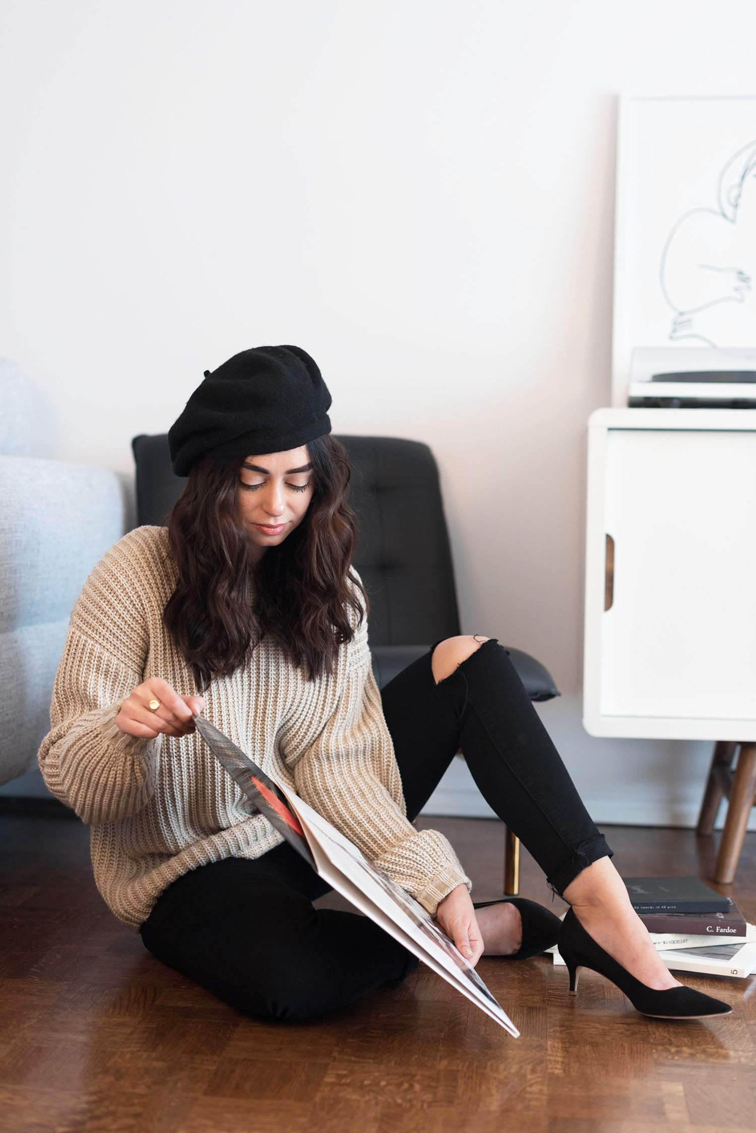 Winnipeg fashion blogger Cee Fardoe of Coco & Vera takes Bruce Springsteen record out of its sleeve, wearing an Anthropologie Bonnie beret and Paige jeans