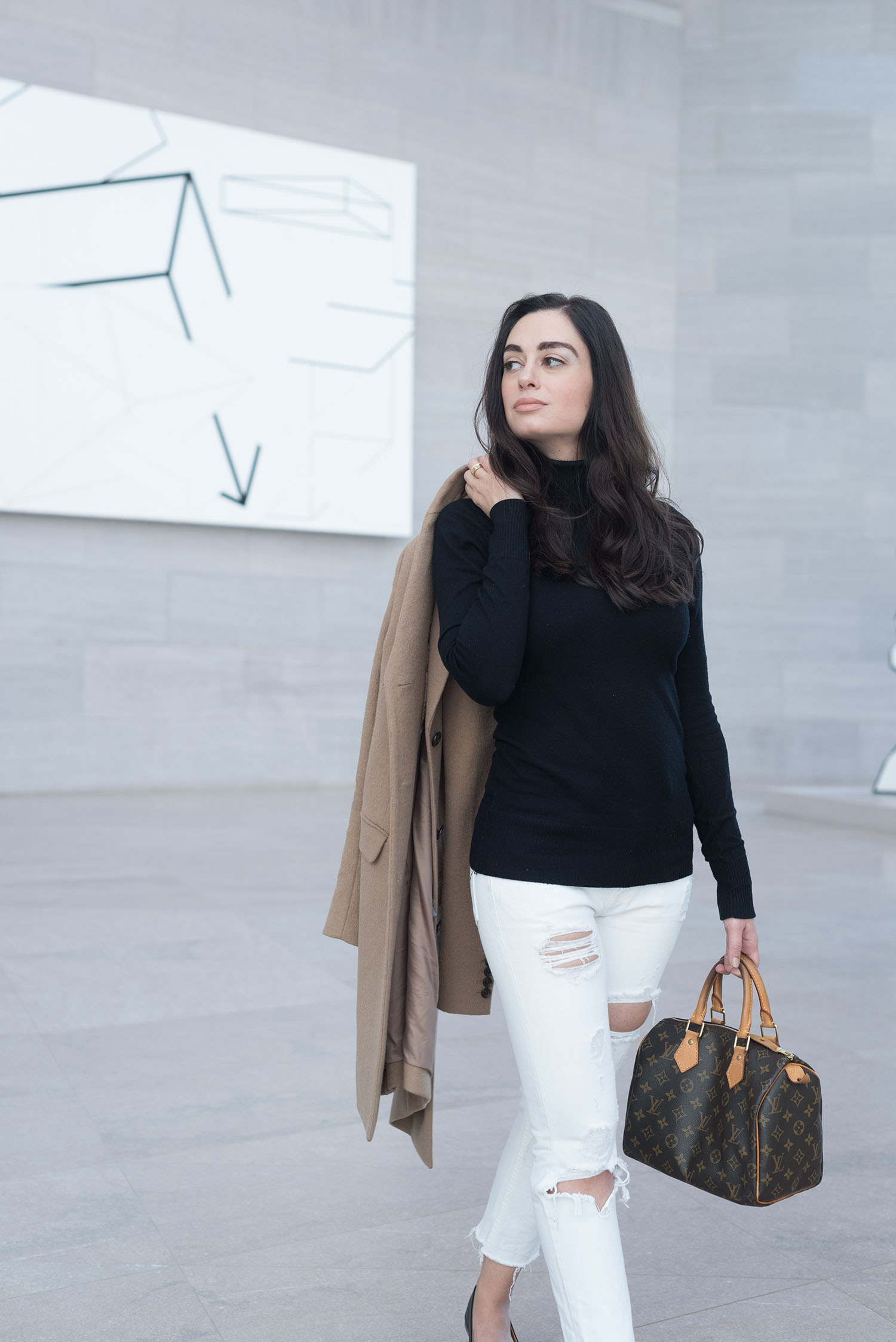 Portrait of Canadian fashion blogger Cee Fardoe of Coco & Vera at the National Gallery of Art in Washington DC, wearing Grlfrnd Karolina jeans and a Le Chateau turtleneck sweater