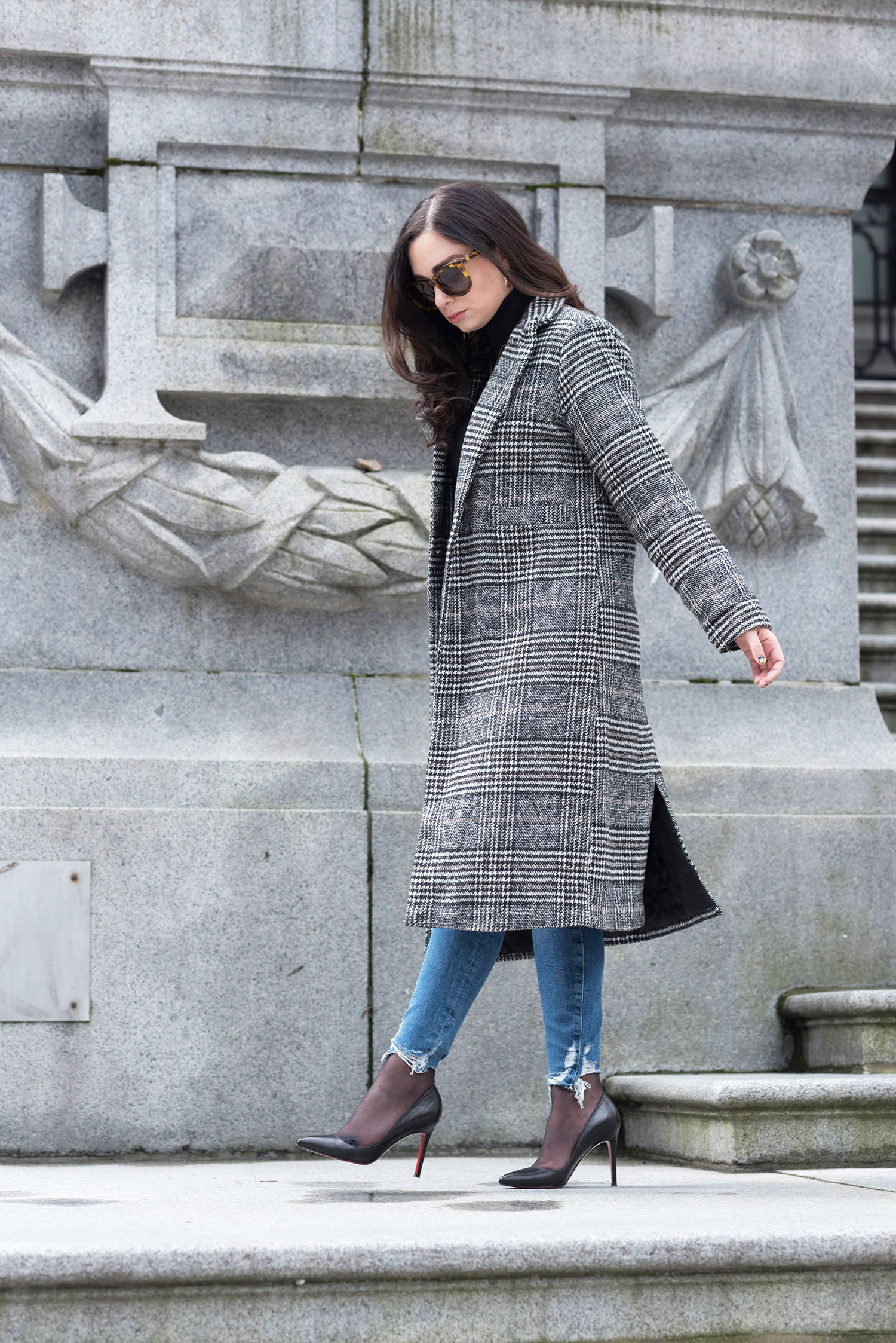 Fashion blogger Cee Fardoe of Coco & vera walks outside the Vancouver Art Gallery wearing a Sheinside coat and Christian Louboutin Pigalle pumps