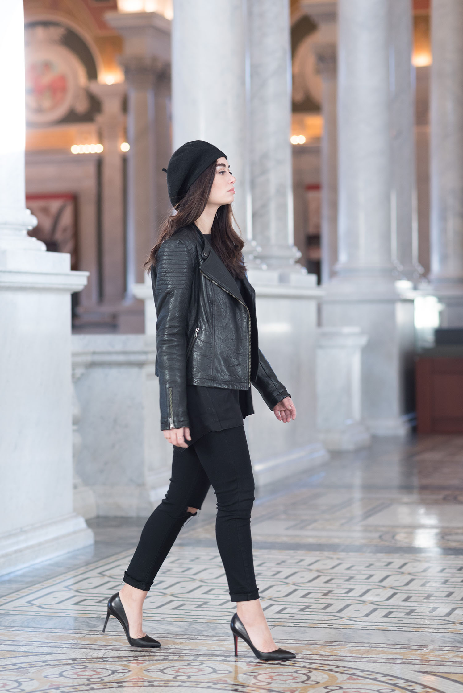 Canadian fashion blogger Cee Fardoe of Coco & Vera walks through the Library of Congress wearing an Anthropologie Bonnie beret and Aritzia Koons blouse
