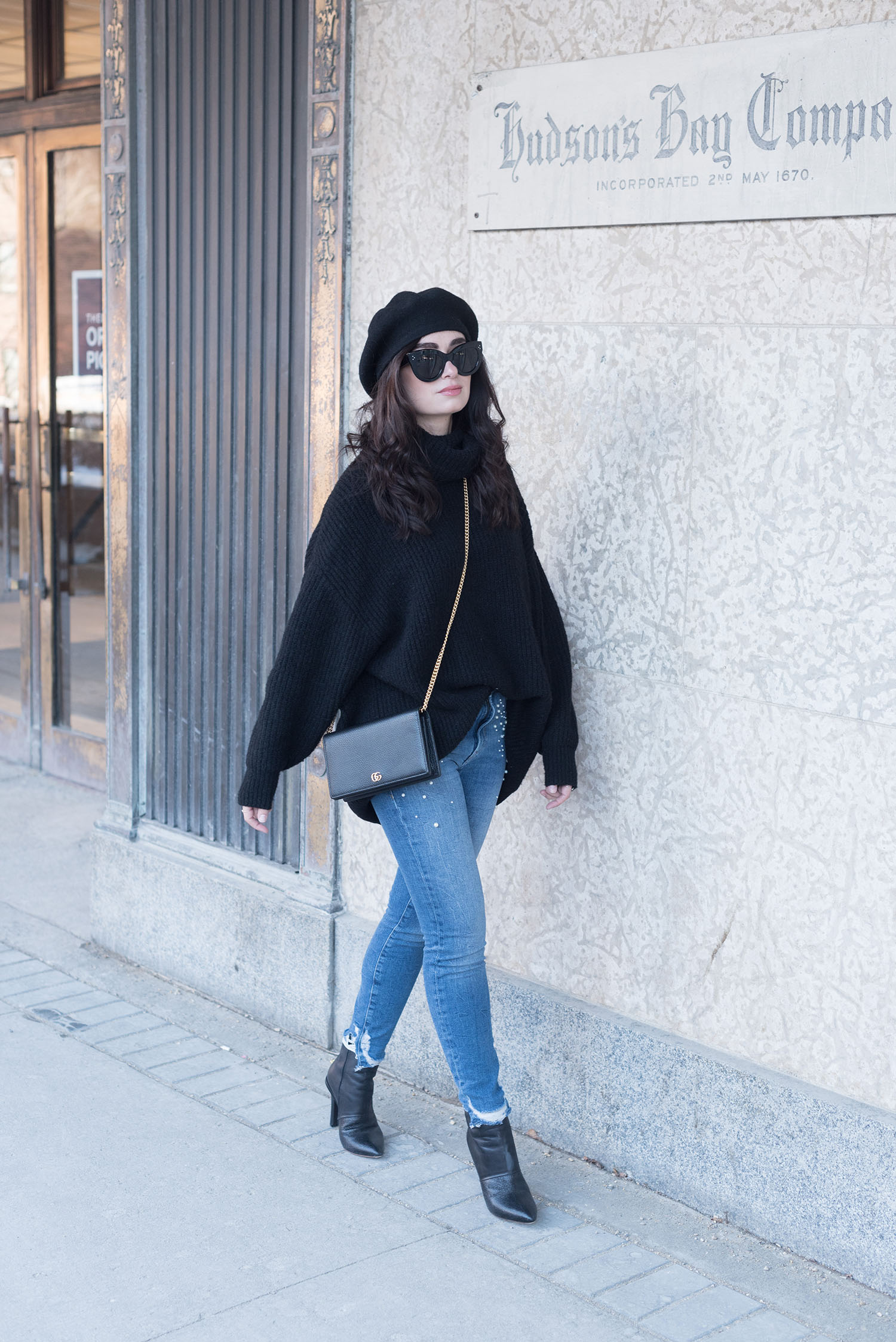 Fashion blogger Cee Fardoe of Coco & Vera walk-in downtown Winnipeg wearing an Anthropologie beret and carrying a Gucci handbag