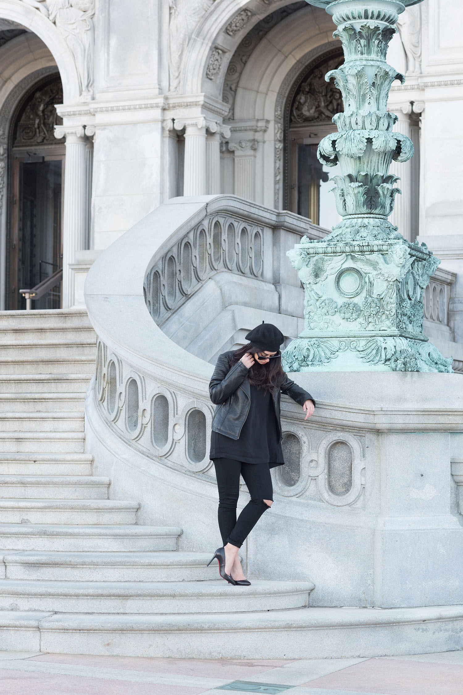 Canadian fashion blogger Cee Fardoe of Coco & Vera stands outside the Library of Congress wearing Paige jeans and Christian Louboutin Pigalle pumps