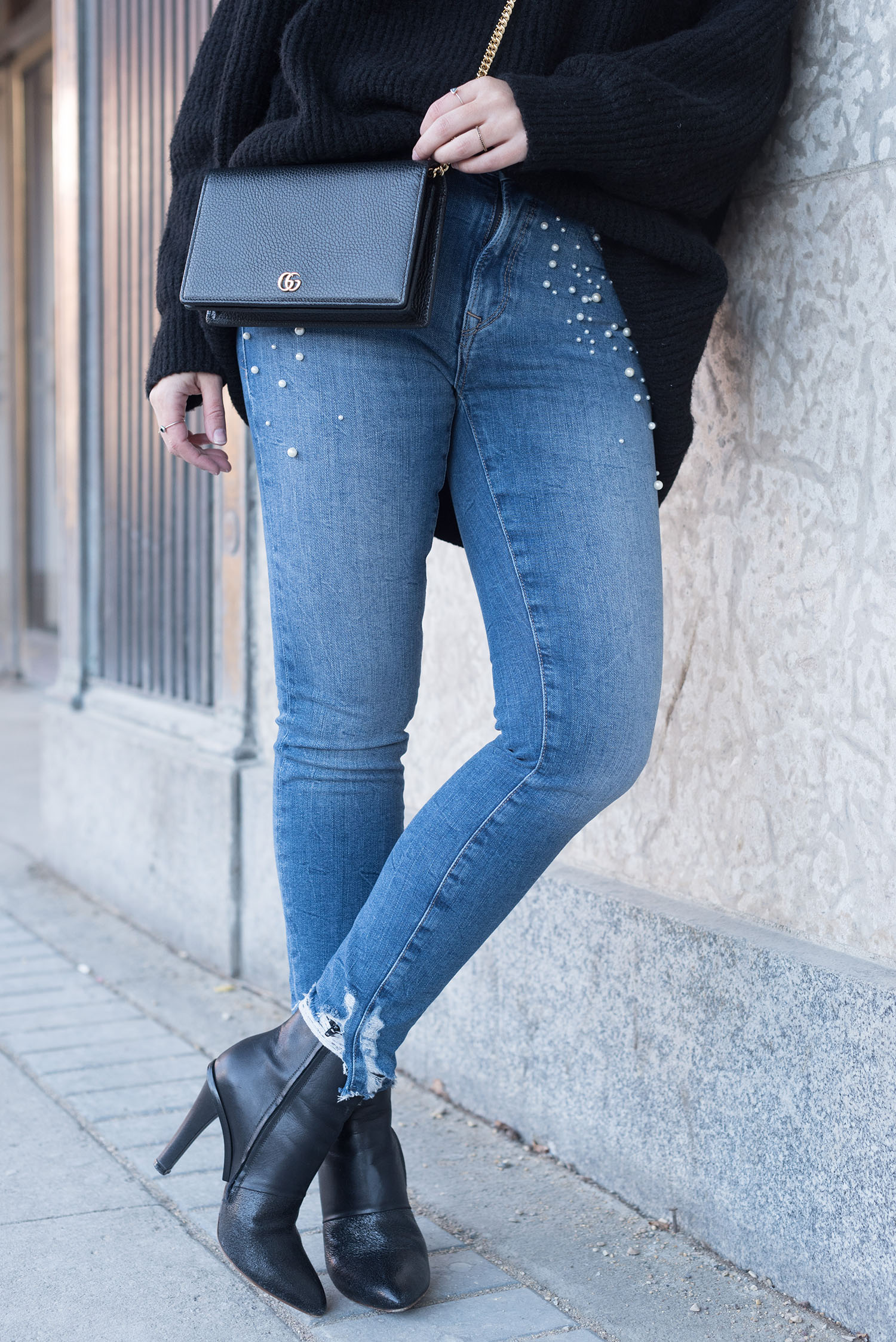 Outfit details on Canadian fashion blogger Cee Fardoe of Coco & Vera, including Mavi pearl-emblazoned jeans and Maison Martin Margiela boots