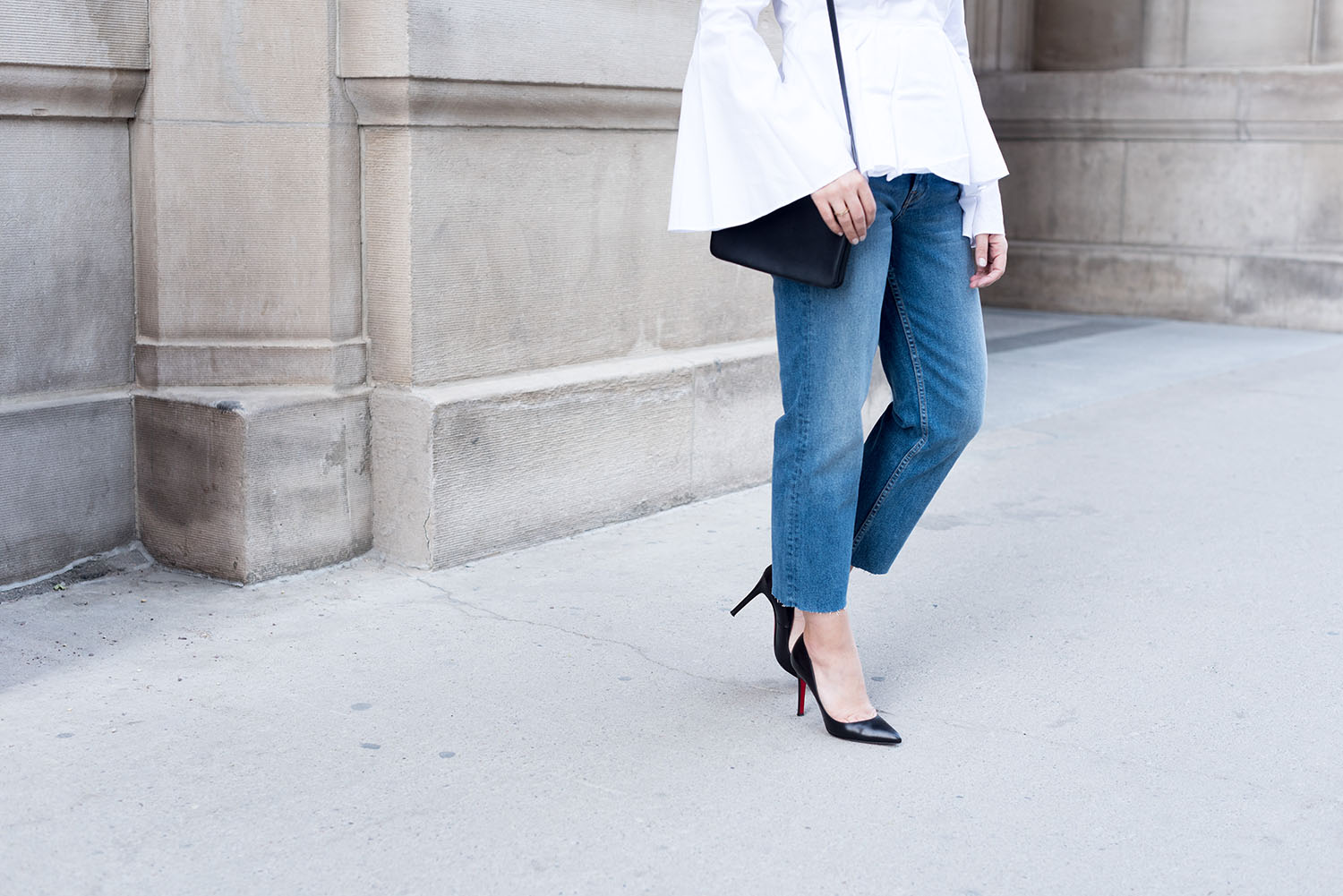 Outfit details on top Winnipeg fashion blogger Cee Fardoe of Coco & Vera, including Grlfrnd Helena jeans and Christian Louboutin Pigalle pumps