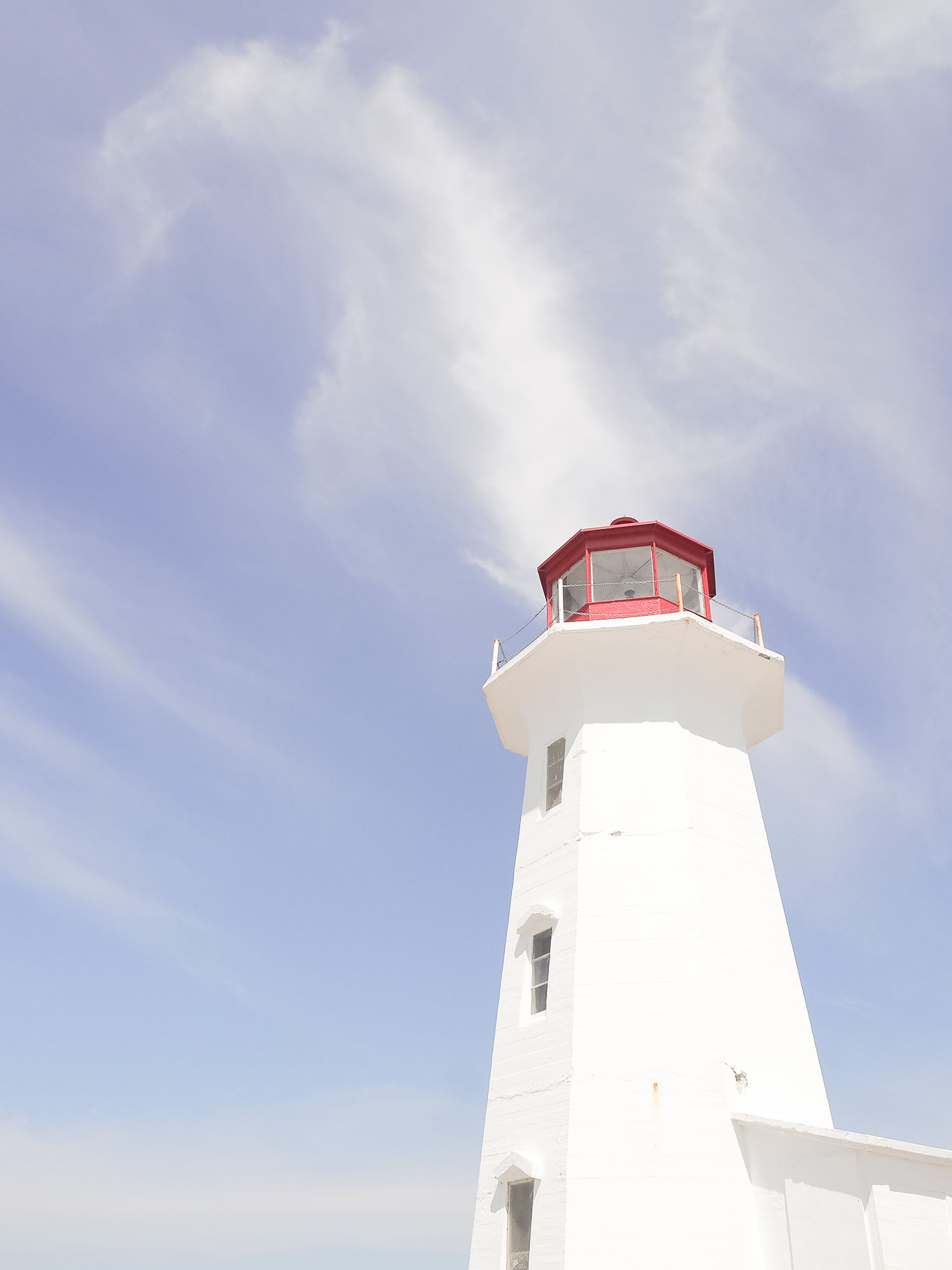 The lighthouse at Peggy's Cove in Nova Scotiaa, as captured by top Winnipeg travel blogger Cee Fardoe of Coco & Vera