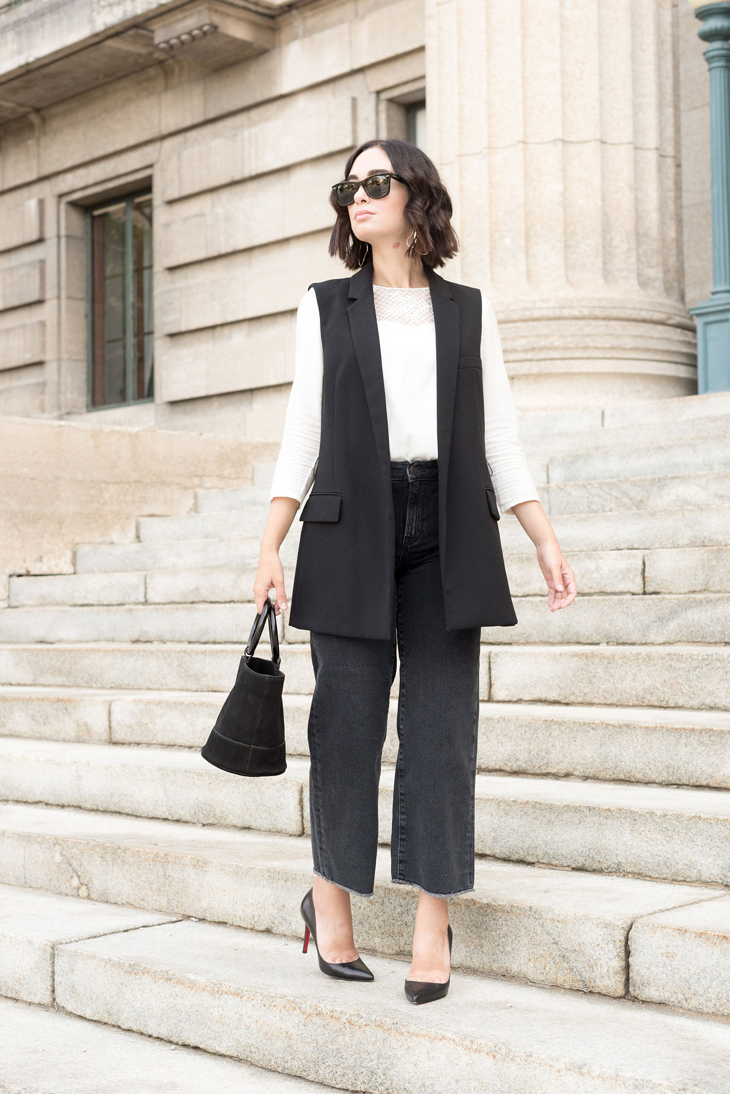 Top Canadian fashion blogger Cee Fardoe of Coco & Vera wears a white Sezane blouse and Mavi jeans