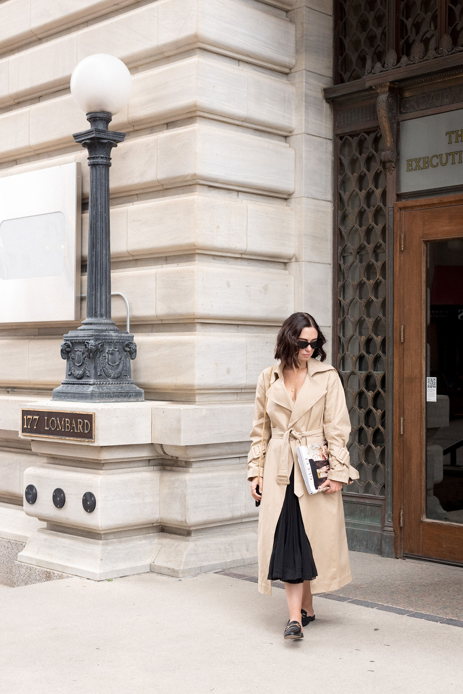 Top Winnipeg fashion blogger Cee Fardoe of Coco & Vera in the Exchange District wearing an H&M trench coat and Aritzia Beaune dress