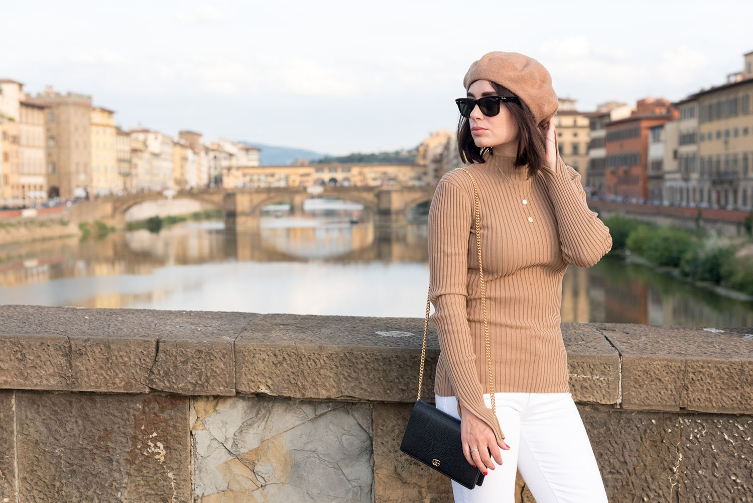 Top Canadian fashion blogger Cee Fardoe in Florence, Italy, wearing RayBan Wayfarer sunglasses and carrying a Gucci Marmont handbag