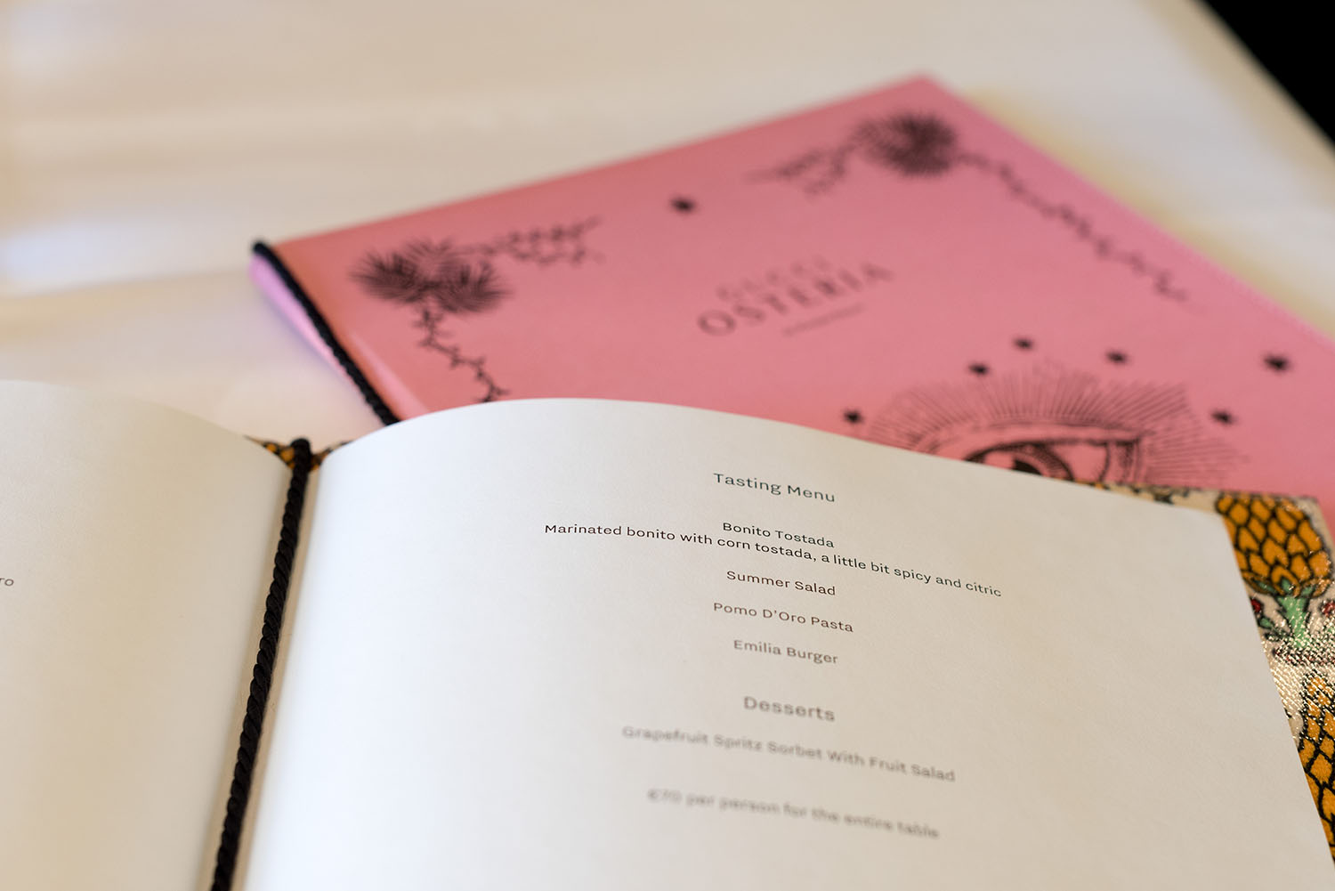 A copy of the menu at the Gucci Osteria by Massimo Bottura, as photographed by top Winnipeg travel blogger Cee Fardoe of Coco & Vera