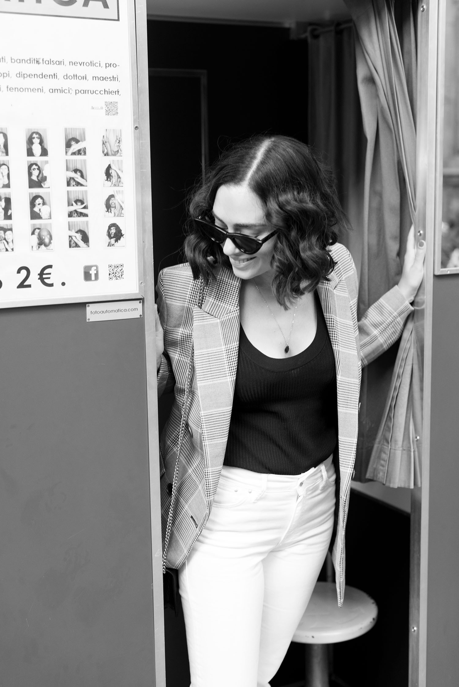 Portrait of top Canadian fashion blogger Cee Fardoe of Coco & Vera in a Photo Booth in Italy wearing a Mango blazer and Zara sunglasses