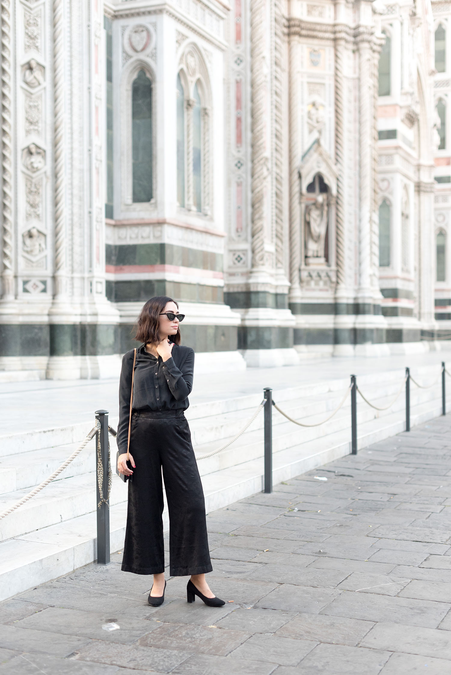 Top Winnipeg fashion blogger Cee Fardoe of Coco & Vera stands outside the Duomo in Florence, Italy, wearing Aritzia brocade culottes and an Everlane silk blouse