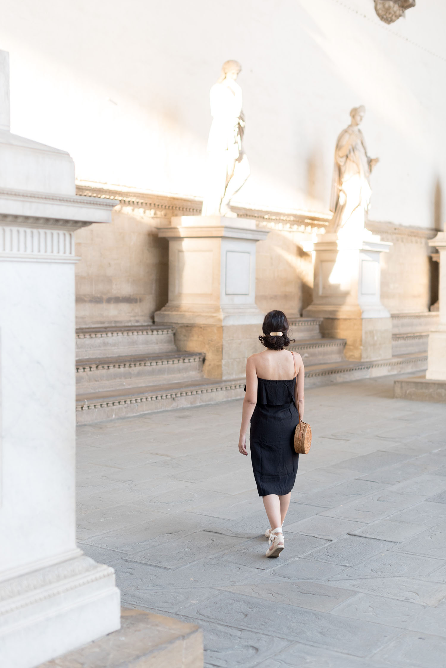 Top Winnipeg fashion blogger Cee Fardoe of Coco & Vera in Florence, Italy, wearing ShopUniques black dress and Mango hairpin