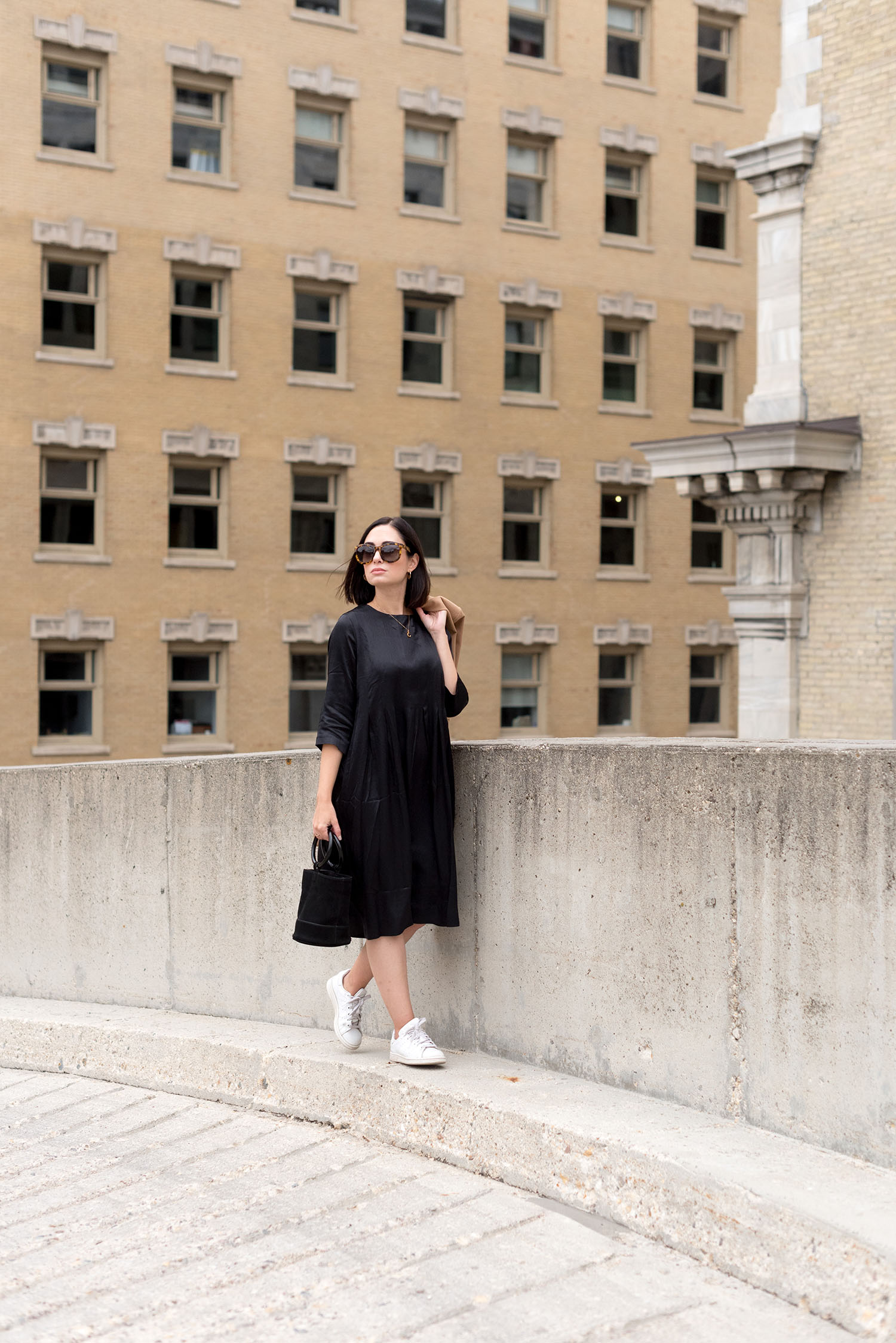 Top Winnipeg fashion blogger Cee Fardoe of Coco & Vera wears a Solika Aurel dress and Adidas sneakers