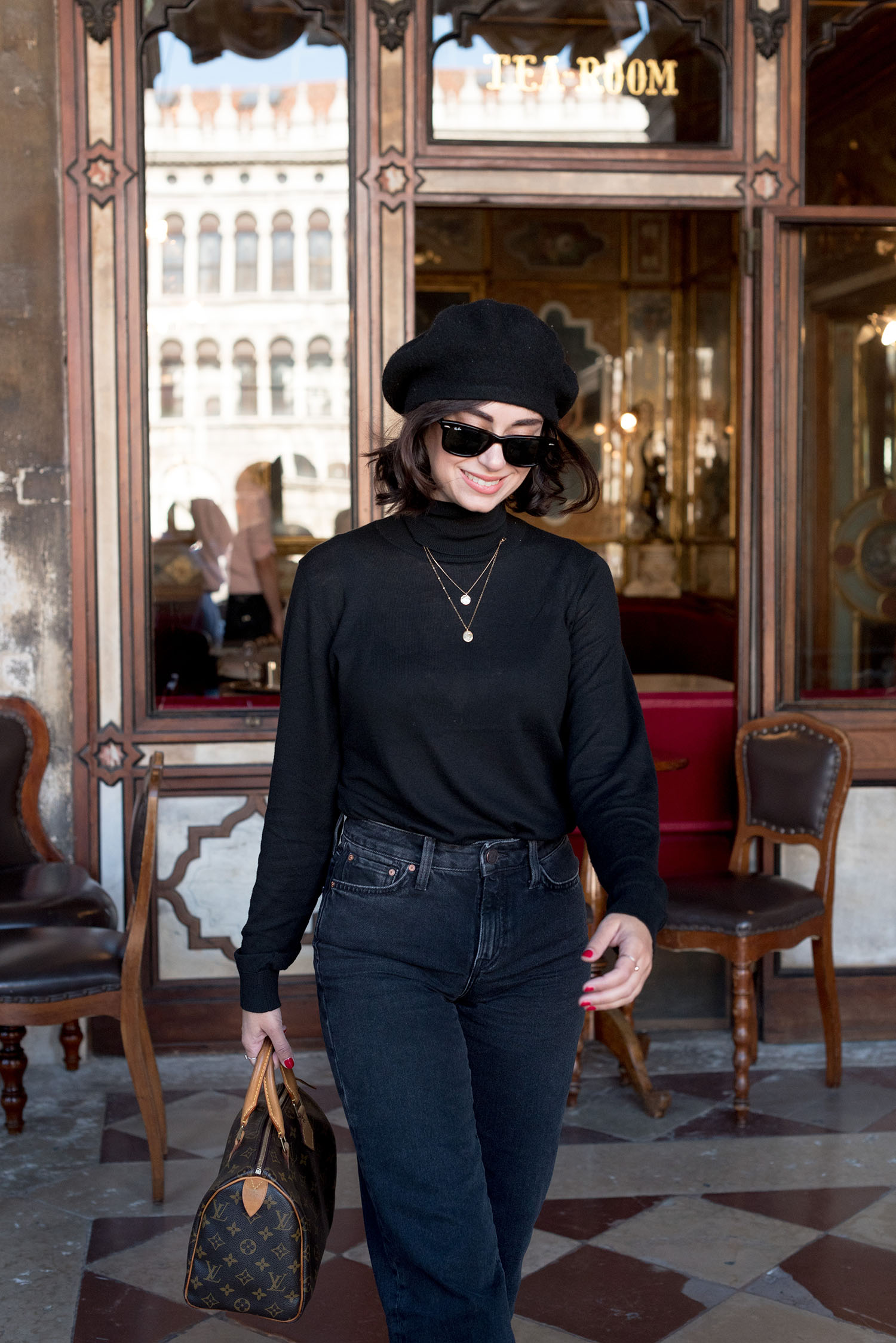 Portrait of top Canadian style blogger Cee Fardoe of Coco & Vera at Caffe Floriane, wearing RayBan Wayfarer sunglasses and carrying a Louis Vuitton Speedy 25 handbag