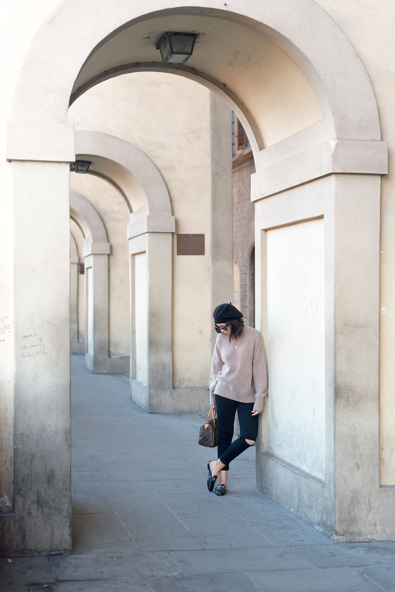 Top Winnipeg fashion blogger Cee Fardoe of Coco & Vera in Florence, Italy, wearing an H&M sweater and Paige jeans