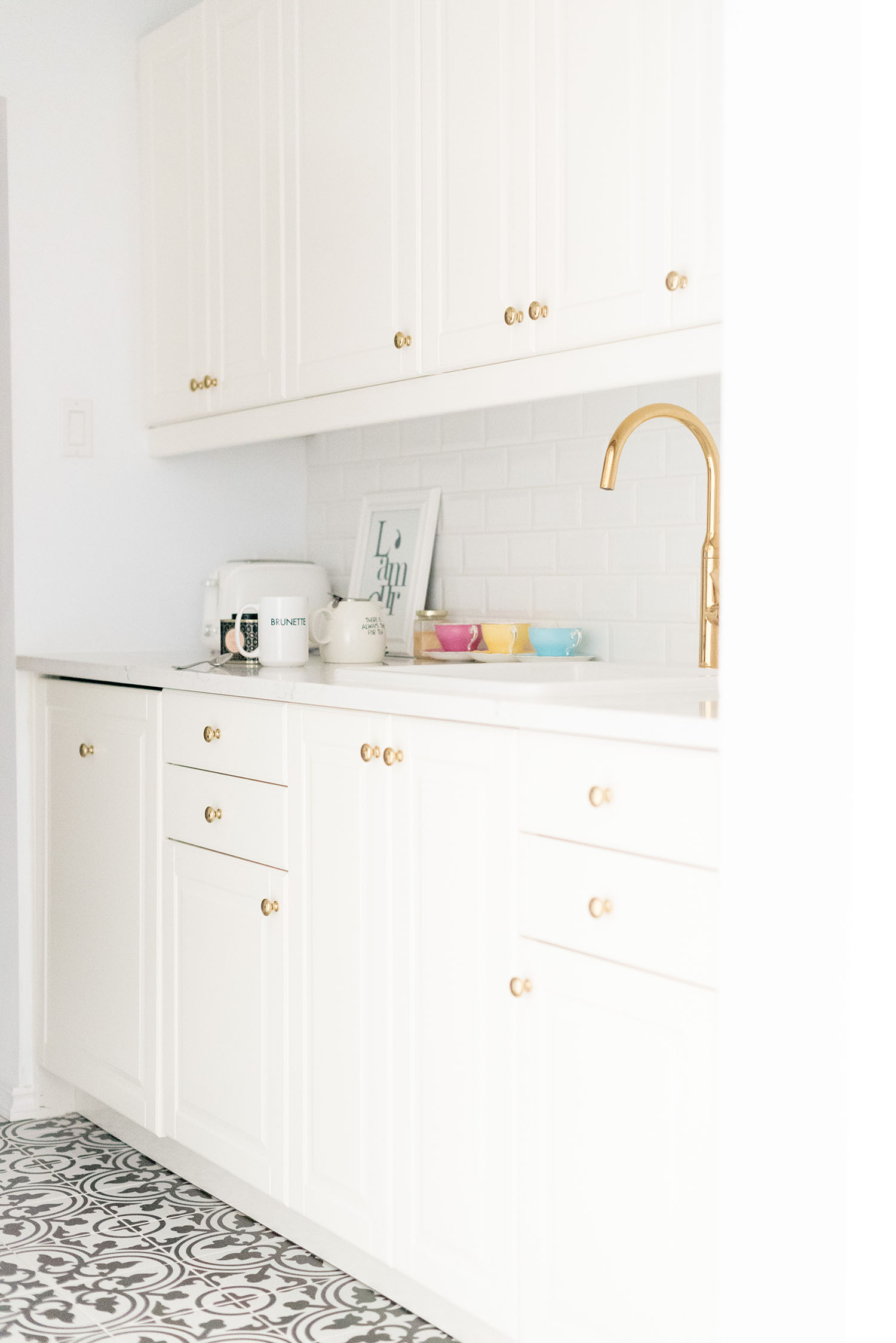 The all white and gold kitchen belonging to top Winnipeg lifestyle blogger Cee Fardoe of Coco & Vera