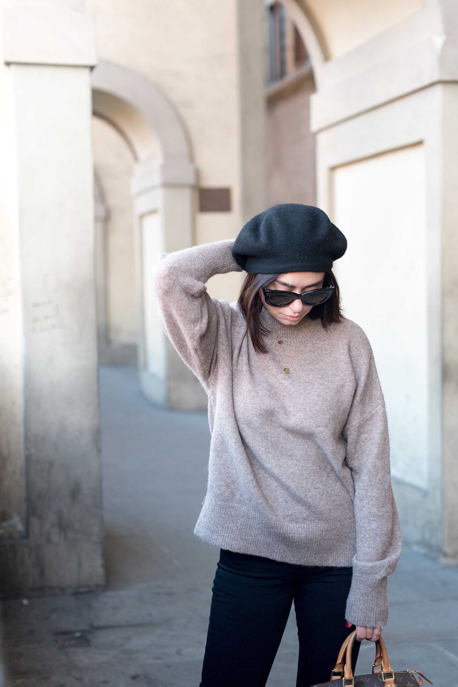 Portrait of top Winnipeg fashion blogger Cee Fardoe of Coco & Vera in Florence, Italy, wearing an Anthropologie beret and Celine Audrey sunglasses