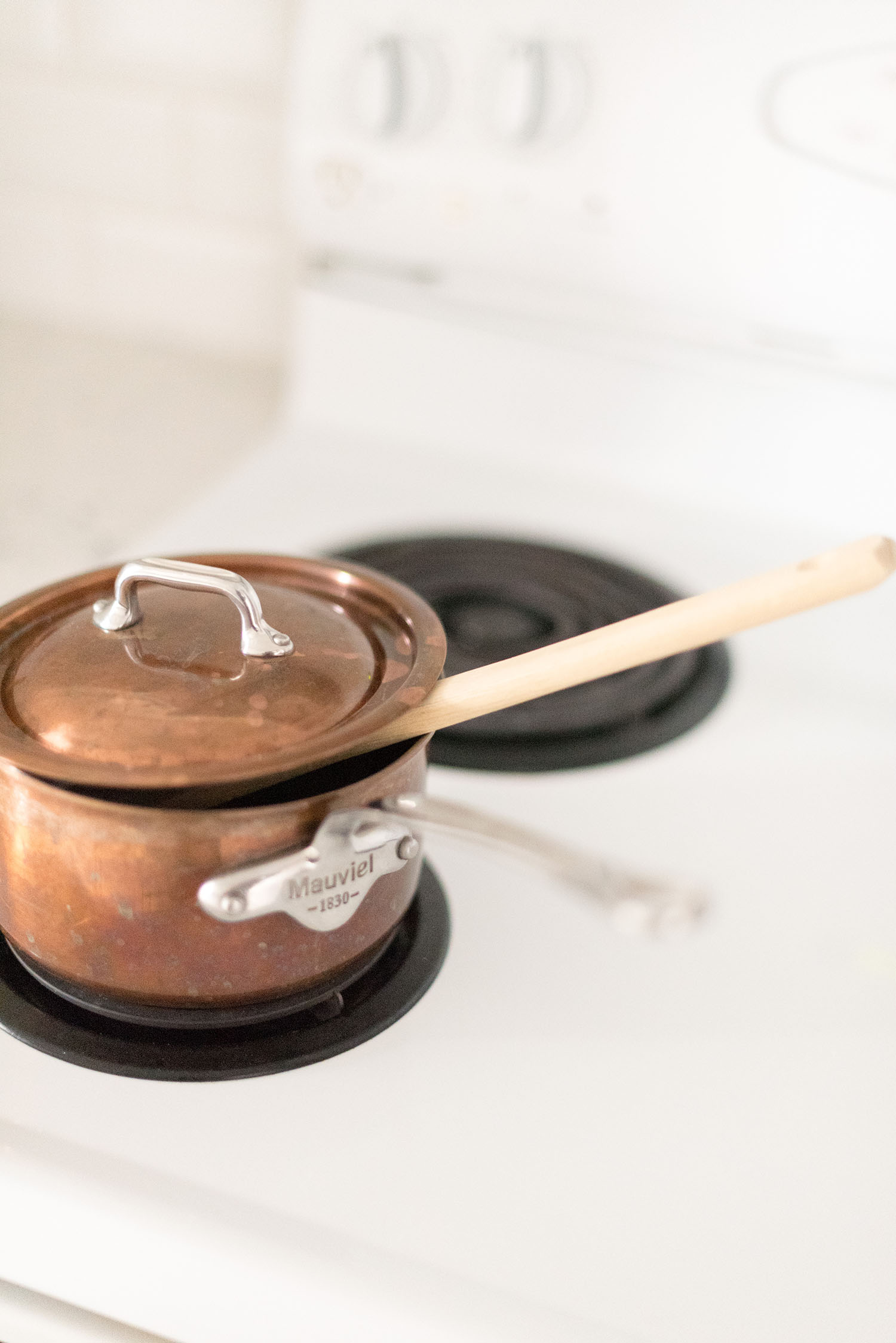 A cooper Mauviel pot in the stove in top Winnipeg lifestyle blogger Cee Fardoe of Coco & Vera's kitchen