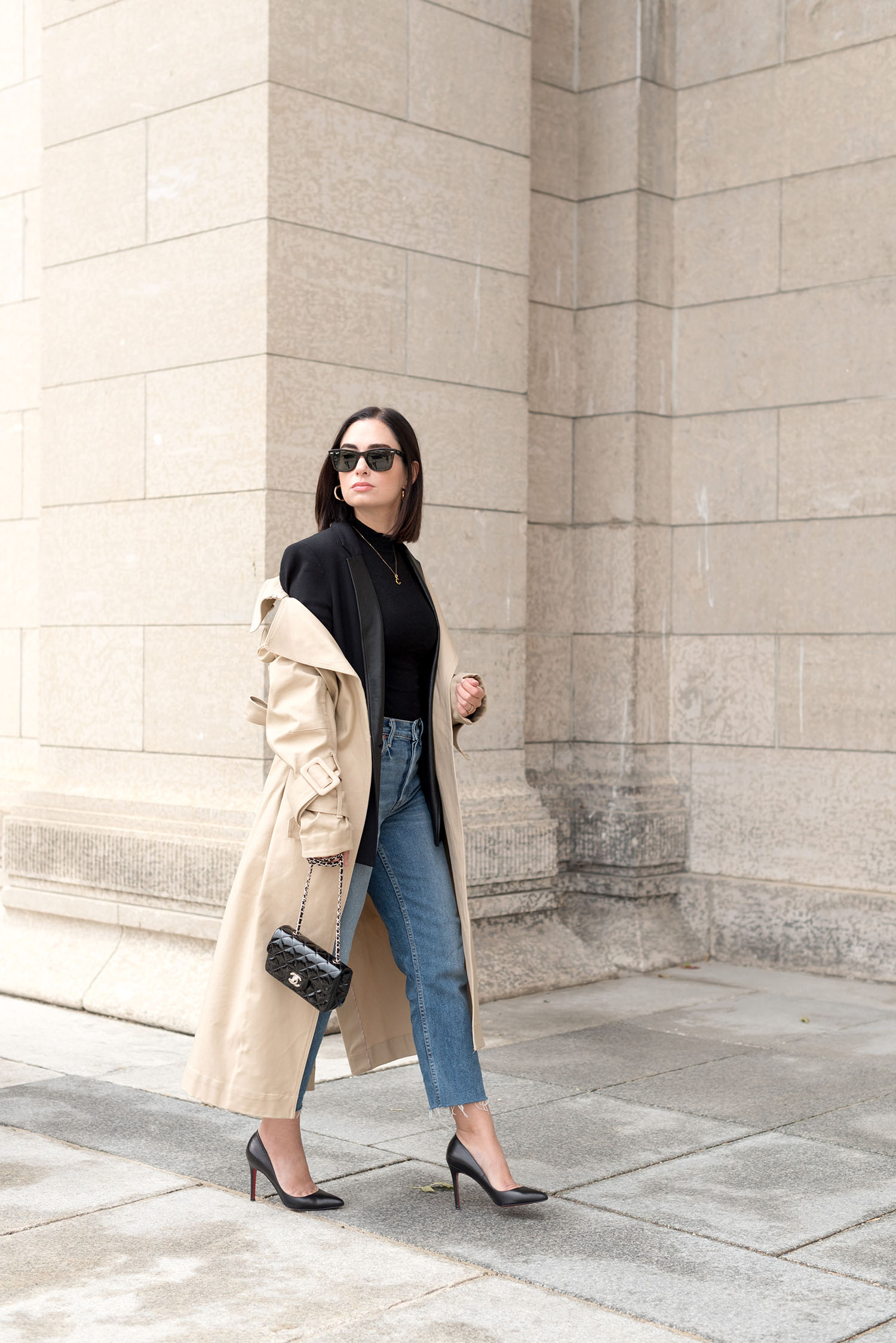 Top Canadian fashion blogger Cee Fardoe of Coco & Vera wears a Helmut Lang blazer and carries a Chanel black patent handbag