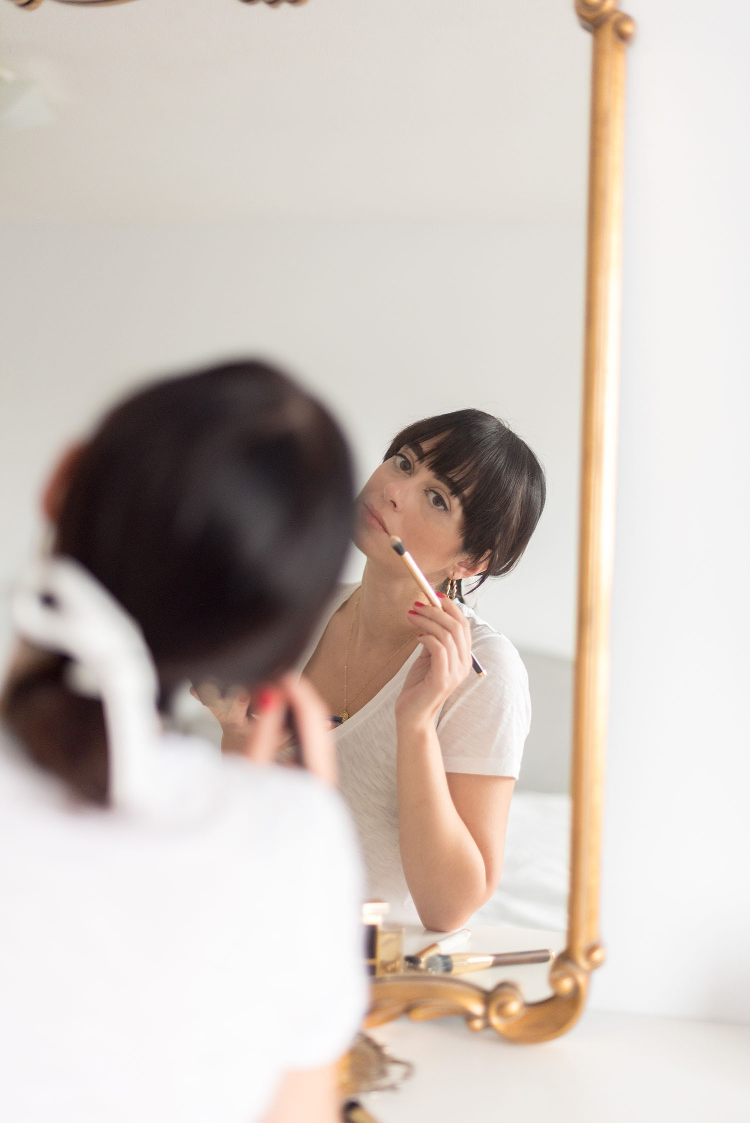 Top Winnipeg beauty blogger Cee Fardoe of Coco & Vera applies eyeshadow using a Charlotte Gainsbourg x Nars brush