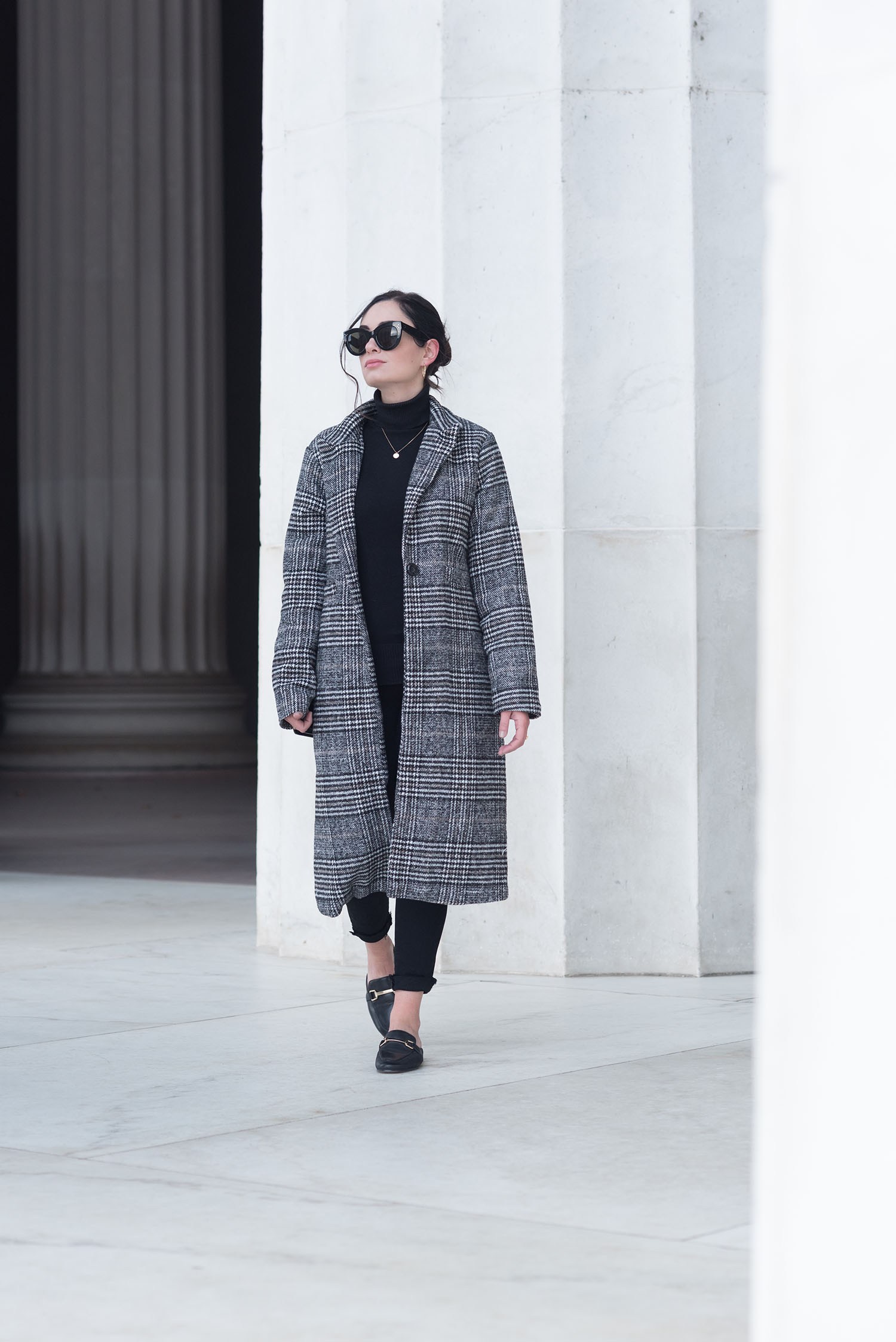 Best Winnipeg fashion blogger Cee Fardoe of Coco & Vera wears a Shein checked coat and Jonak mules