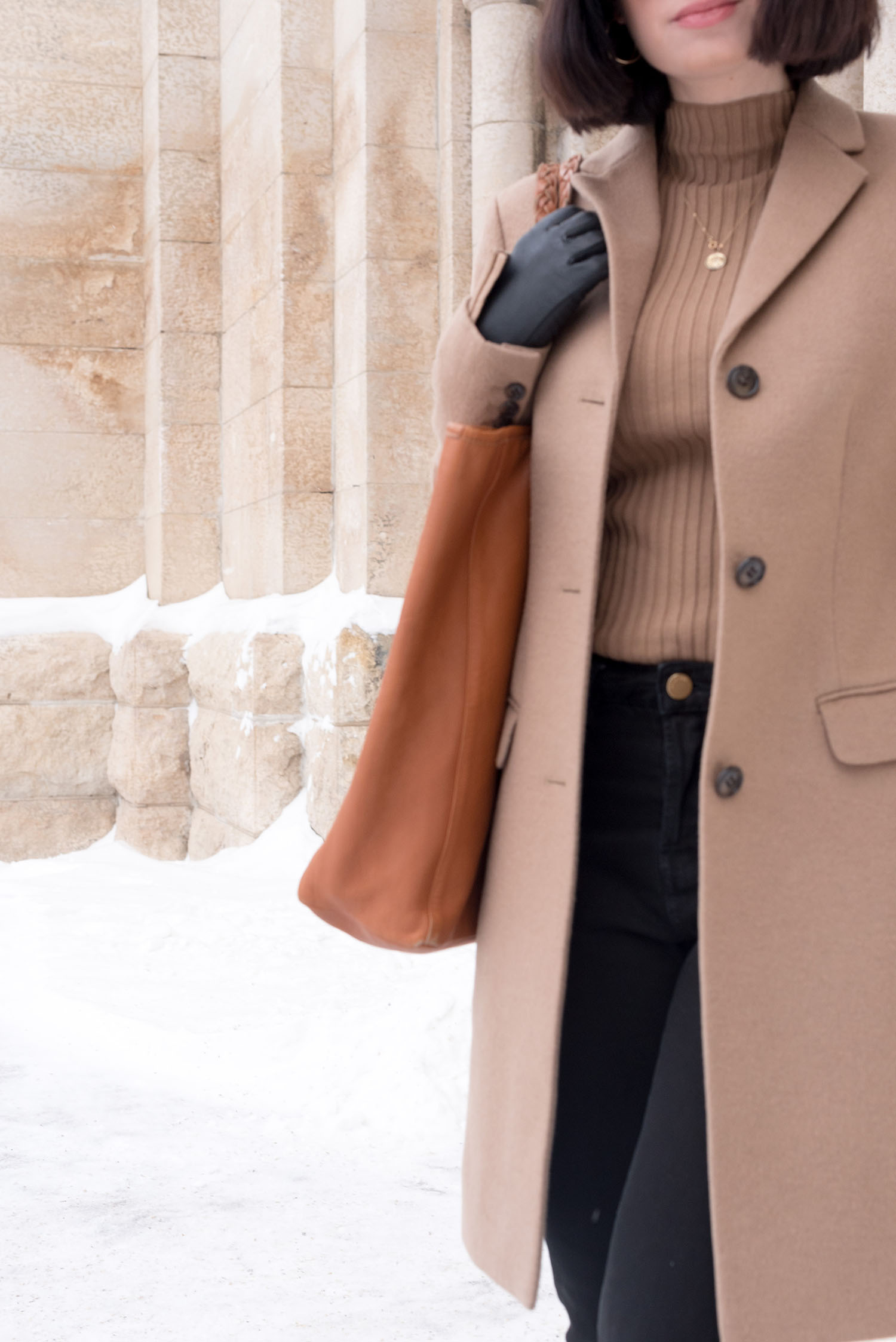 Outfit details on top Winnipeg fashion blogger Cee Fardoe of Coco & Vera, including a Les Composantes tote and Uniqlo camel coat