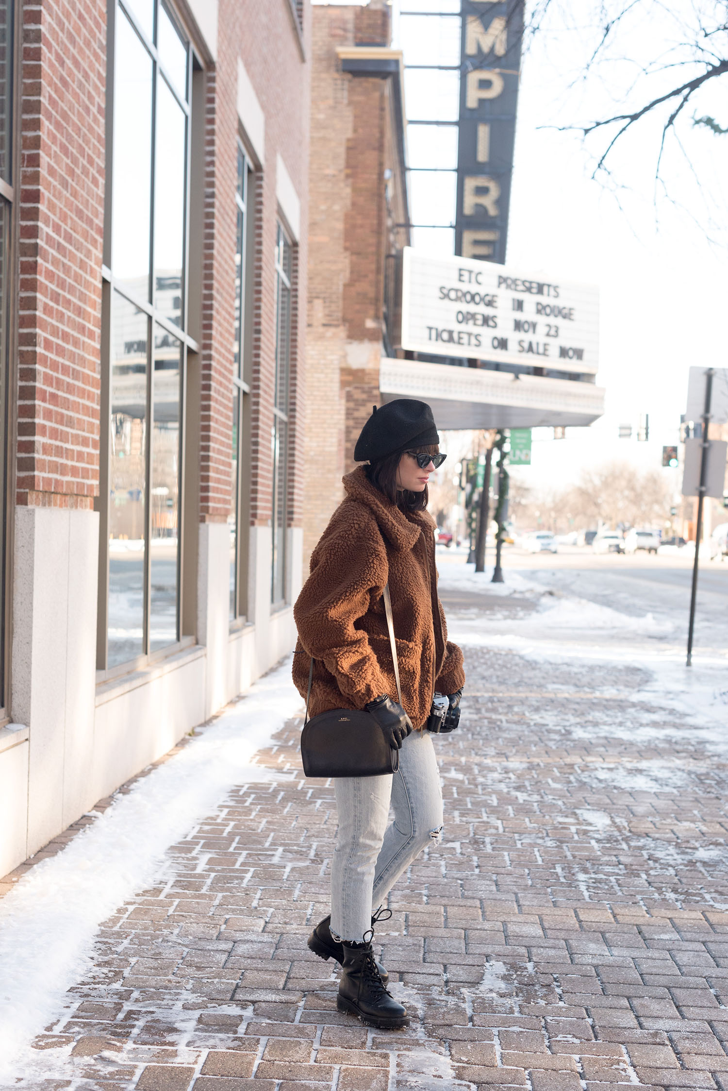 Top Winnipeg fashion blogger Cee Fardoe of Coco & Vera wears Levi's 501 skinny jeans and carries an APC half-moon bag in grand Forks, North Dakota