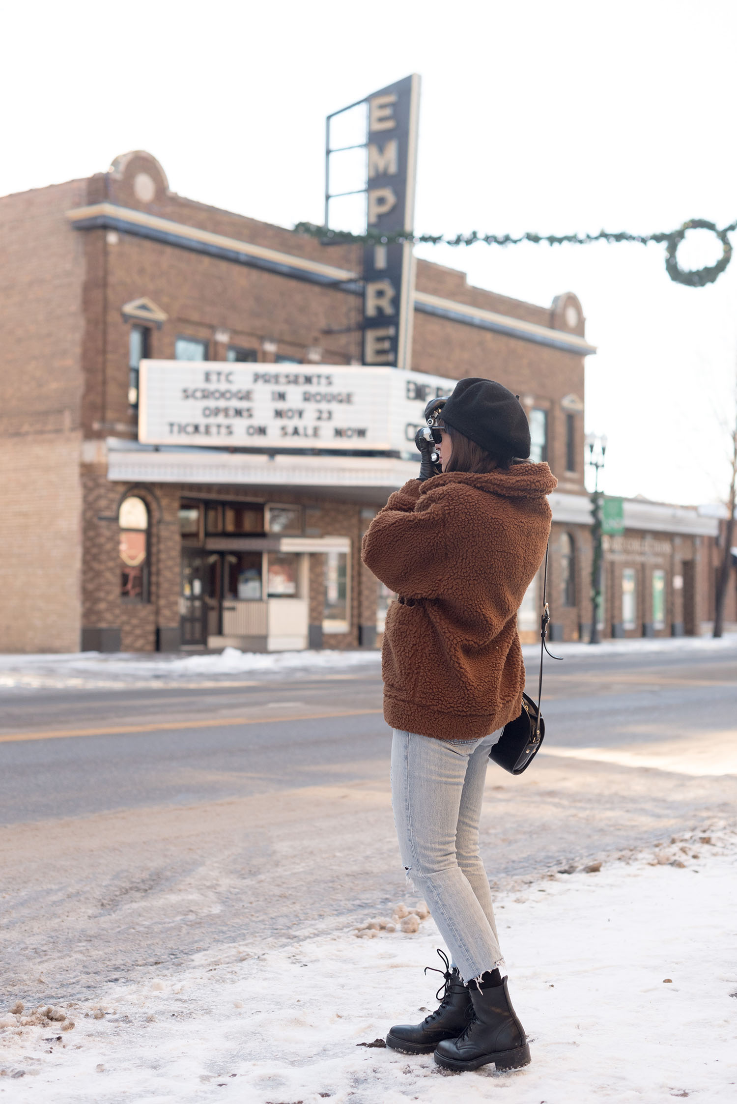 Top Winnipeg fashion blogger Cee Fardoe of Coco & Vera wears a Garage Clothing jacket and Levi's jeans in Grand Forks, North Dakota