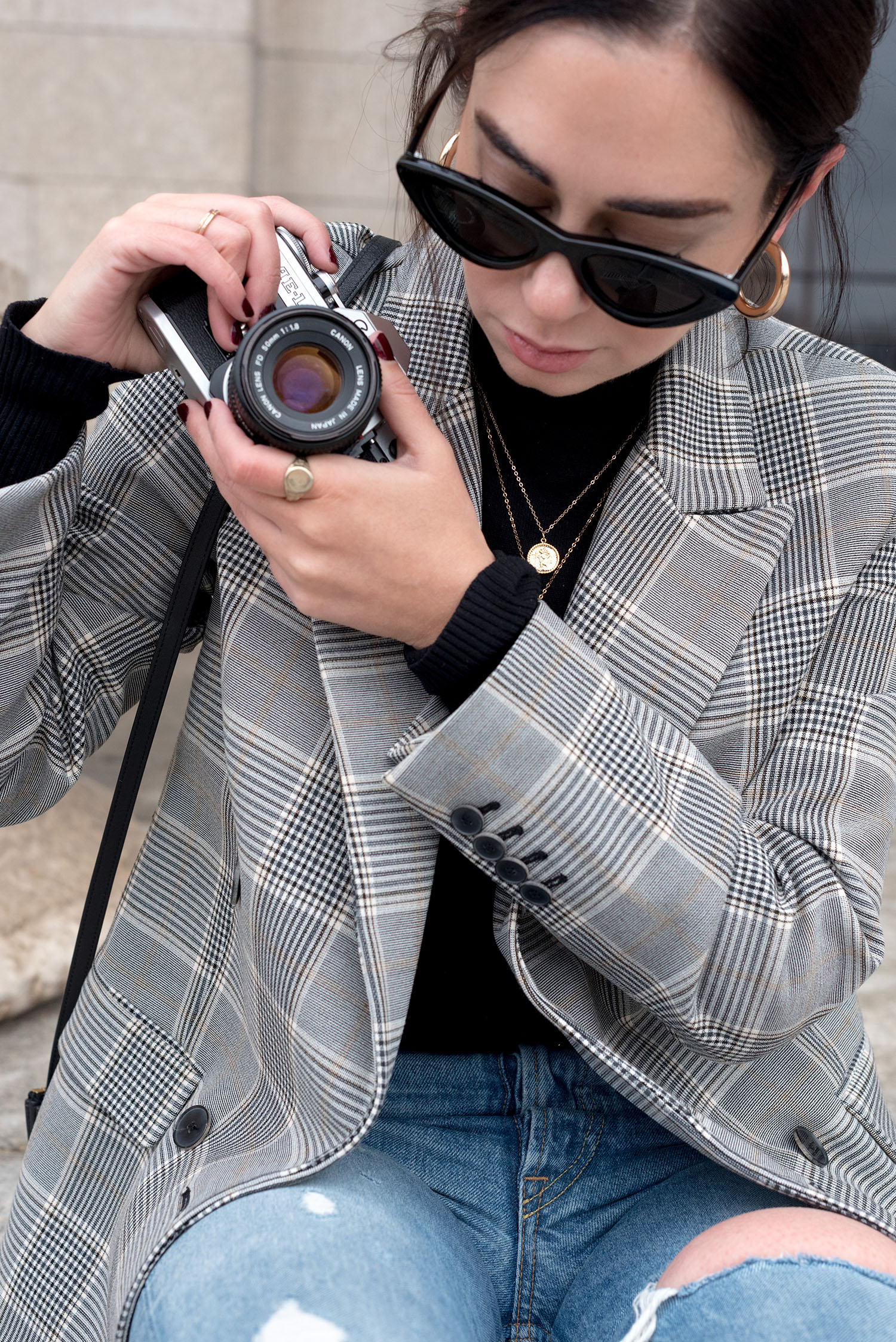 Portrait of top Canadian fashion blogger Cee Fardoe of Coco & Vera wearing Zara cat eye sunglasses and a Mango blazer