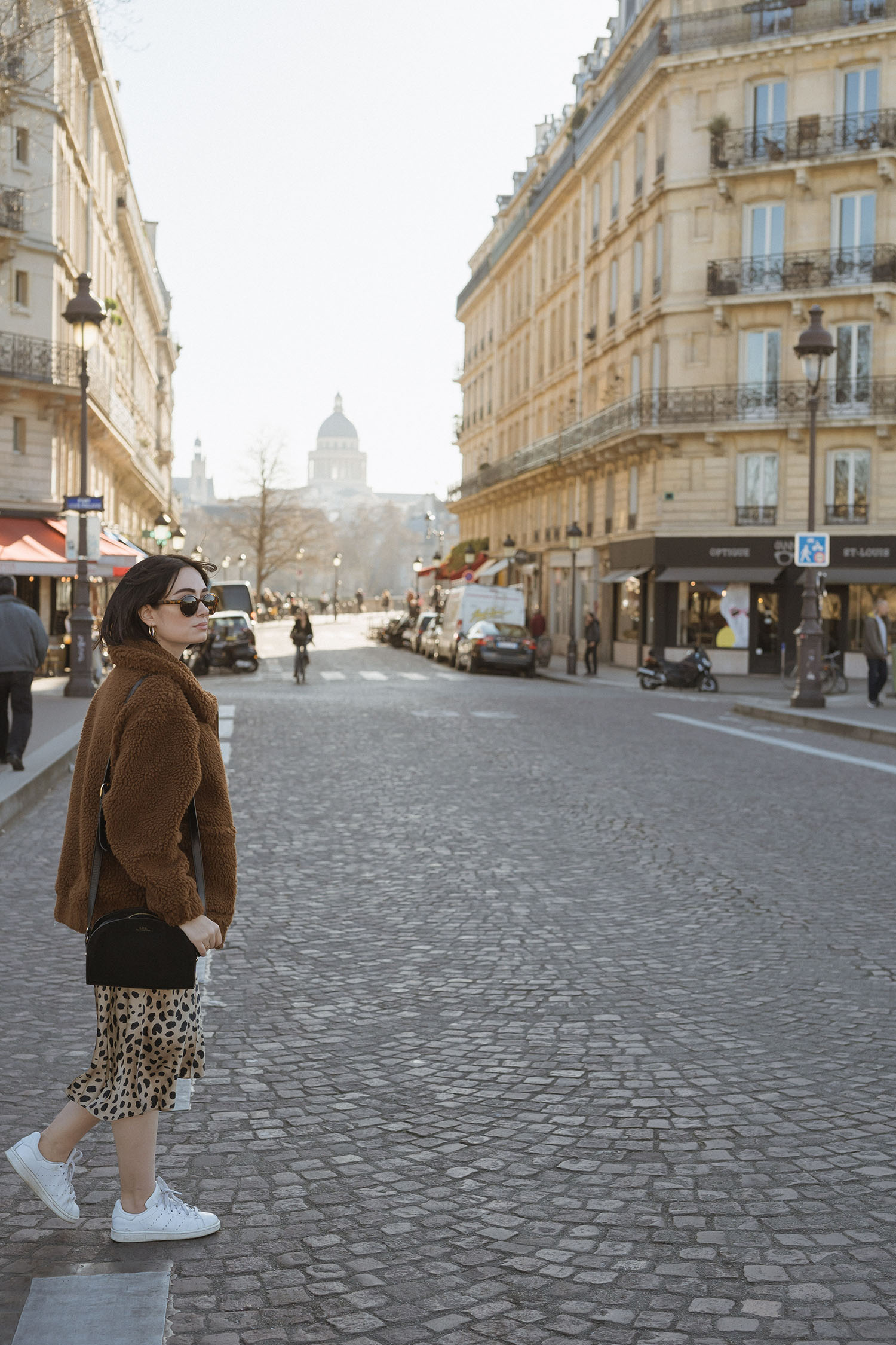 Top Canadian fashion blogger Cee Fardoe of Coco & Vera wears a Realisation Par Naomi skirt and carries an APC half-moon bag in Paris